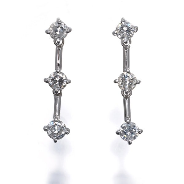 Diamond 0.50Ct/ 0.50Ct 3P Drop Earrings 18K 750 White Gold: Diamond 0.50Ct/ 0.50Ct 3P Drop Earrings 18K 750 White Gold 18k white gold drop earrings feature two natural diamonds, totaling 0.50ct each, creating a stunning 3P drop design. The delicate earring