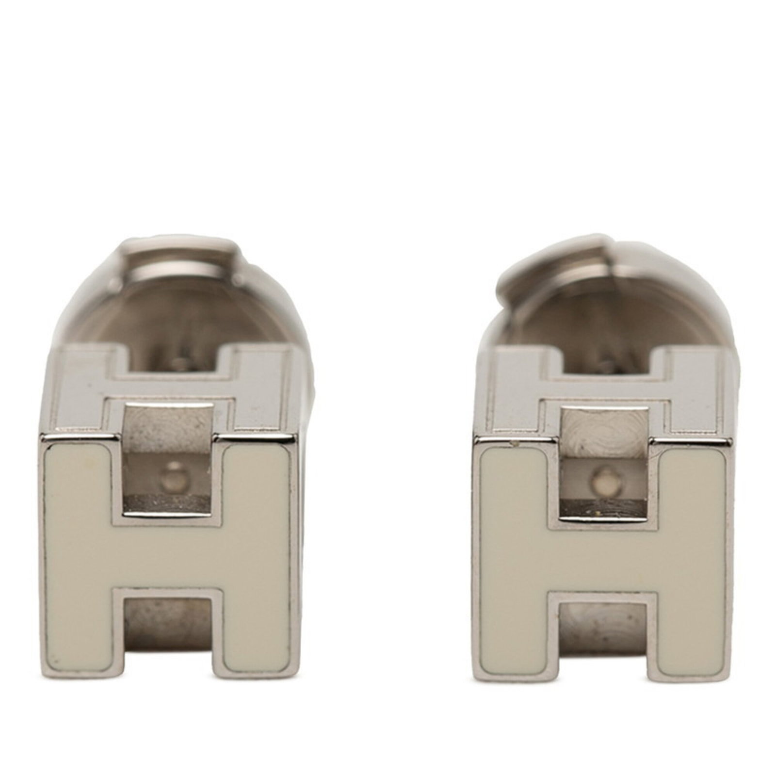 Hermes metal earrings stud: Hermes metal earrings stud Stud earrings from the iconic French luxury brand Hermes, crafted in silver with a sleek and modern design. The small size makes them versatile for everyday wear, while the 