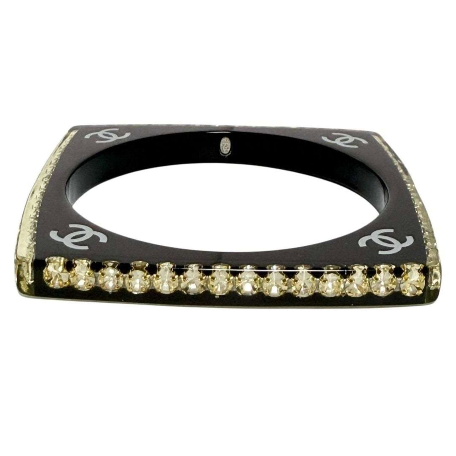 Rhinestone Bangle Plastic Chanel: Rhinestone Bangle Plastic Chanel This Rhinestone Bangle Plastic Chanel features rhinestones and is made from plastic, with a black color and a length of 20cm. The bangle's design bears a signature,