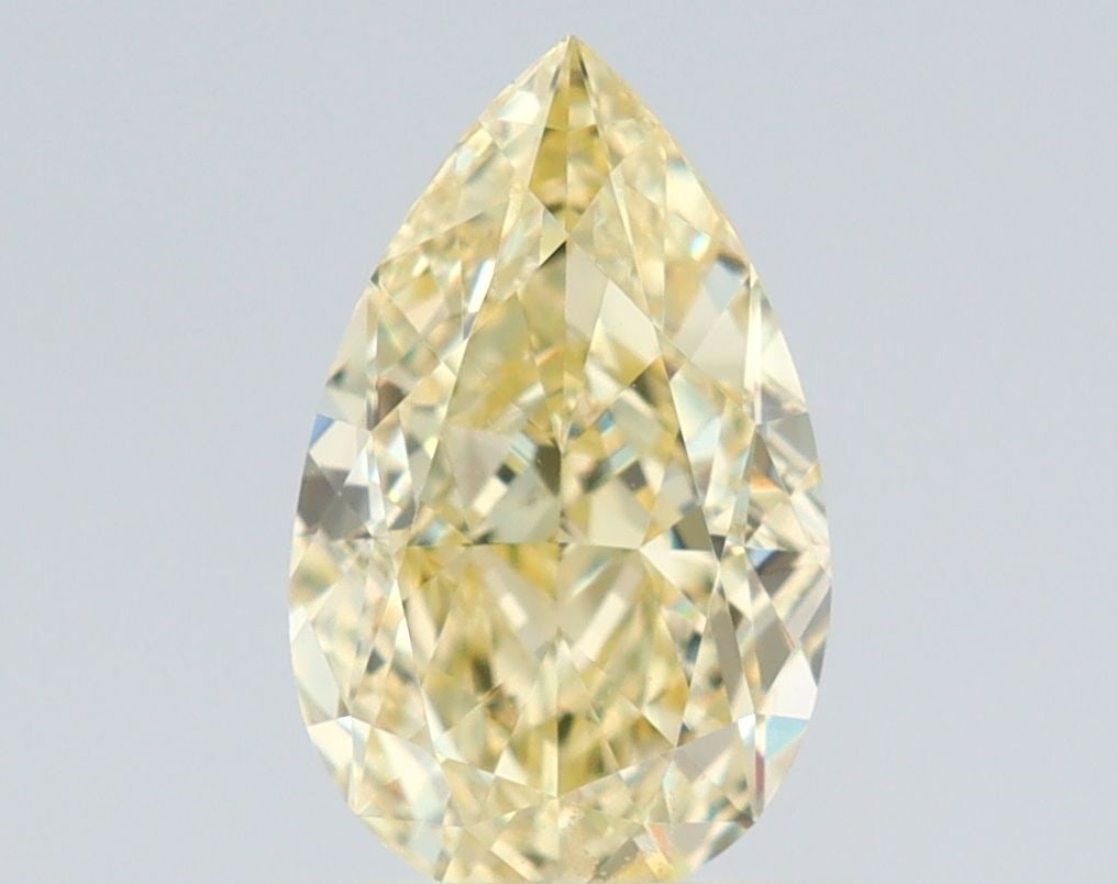 GIA Pear 1.0ct Fancy Light Yellow VVS2 - Loose Natural Diamond: GIA Pear 1.0ct Fancy Light Yellow VVS2 - Loose Natural Diamond GIA certification ensures the diamond's quality and origin. This loose, natural Fancy Light Yellow VVS2 pear-shaped diamond boasts except