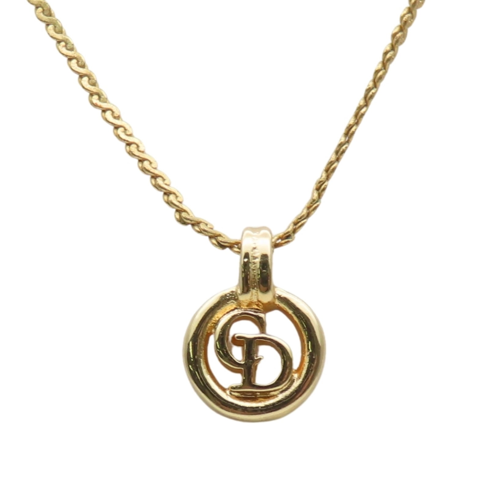Christian Dior Necklace Gold Plated Metal Cd Logo: Christian Dior Necklace Gold Plated Metal Cd Logo Gold plated metal Cd logo necklace from Christian Dior, featuring a 12mm x 9mm pendant with a 38 cm chain circumference. The necklace weighs 2.9g and