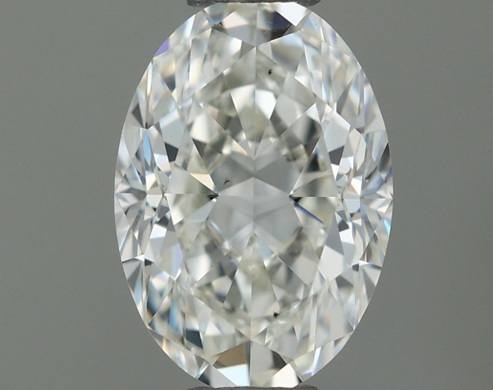 IGI Oval 0.51ct H VVS2 - Loose Natural Diamond: IGI Oval 0.51ct H VVS2 - Loose Natural Diamond 0.51ct IGI Oval H VVS2 Diamond - Natural BeautyThe 0.51ct IGI oval diamond boasts exceptional clarity and color, with a high VVS2 grade indicating minima