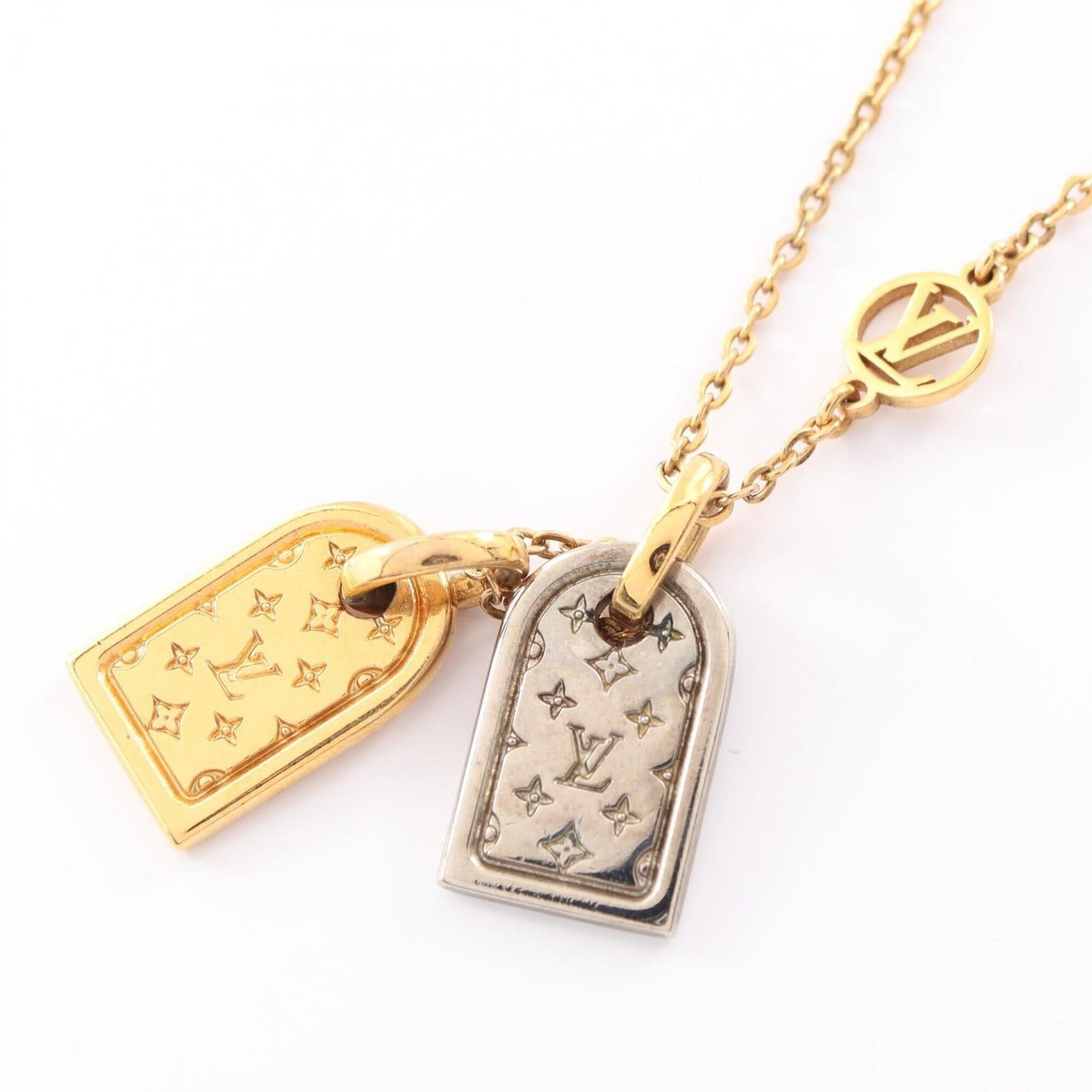 Louis Vuitton Nanogram Necklace Gold Plated Stainless Steel Women'S Gold/ Silver Tone M63141: Louis Vuitton Nanogram Necklace Gold Plated Stainless Steel Women'S Gold/ Silver Tone M63141 Gold plated stainless steel necklace with a 15mm x 9mm pendant, available in gold and silver tone options. 