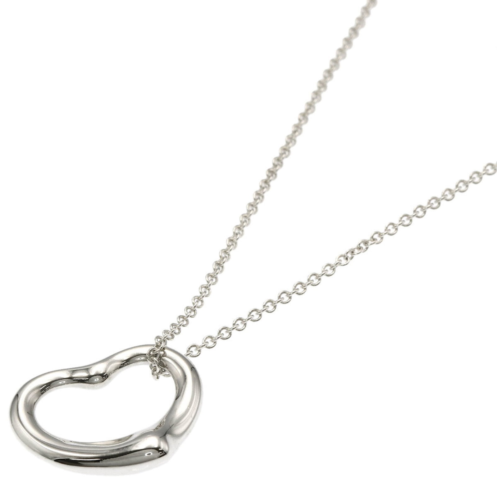 Tiffany & Co. Open Heart Necklace Silver Women'S.: Tiffany & Co. Open Heart Necklace Silver Women'S. The Tiffany & Co. Open Heart Necklace in silver boasts an elegant design with a striking open heart pendant, measuring 19.7mm x 21.6mm. This beautiful