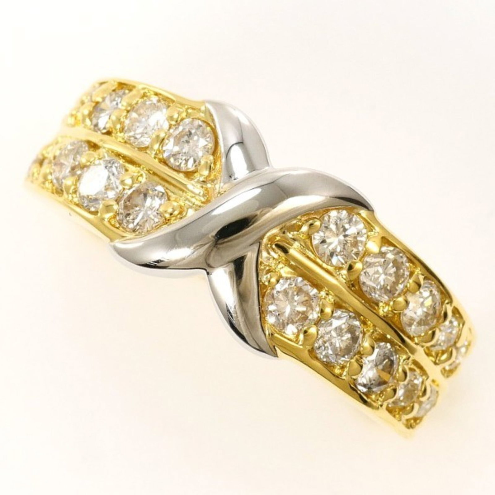 Unbranded Band Ring Platinum 900 Yellow Gold (18K): Unbranded Band Ring Platinum 900 Yellow Gold (18K) Platinum 900 Yellow Gold (18K) band ring features a diamond weighing 0.63 carats, set in a sturdy 7mm wide design with a US size 4.5 fit. Made from h