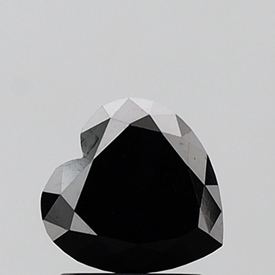Heart 1.87ct Black VVS2 - Loose Natural Diamond: Heart 1.87ct Black VVS2 - Loose Natural Diamond The 1.87ct black diamond boasts exceptional clarity, with its VVS2 grade indicating minimal inclusions and optimal transparency. Its EX polish and symme