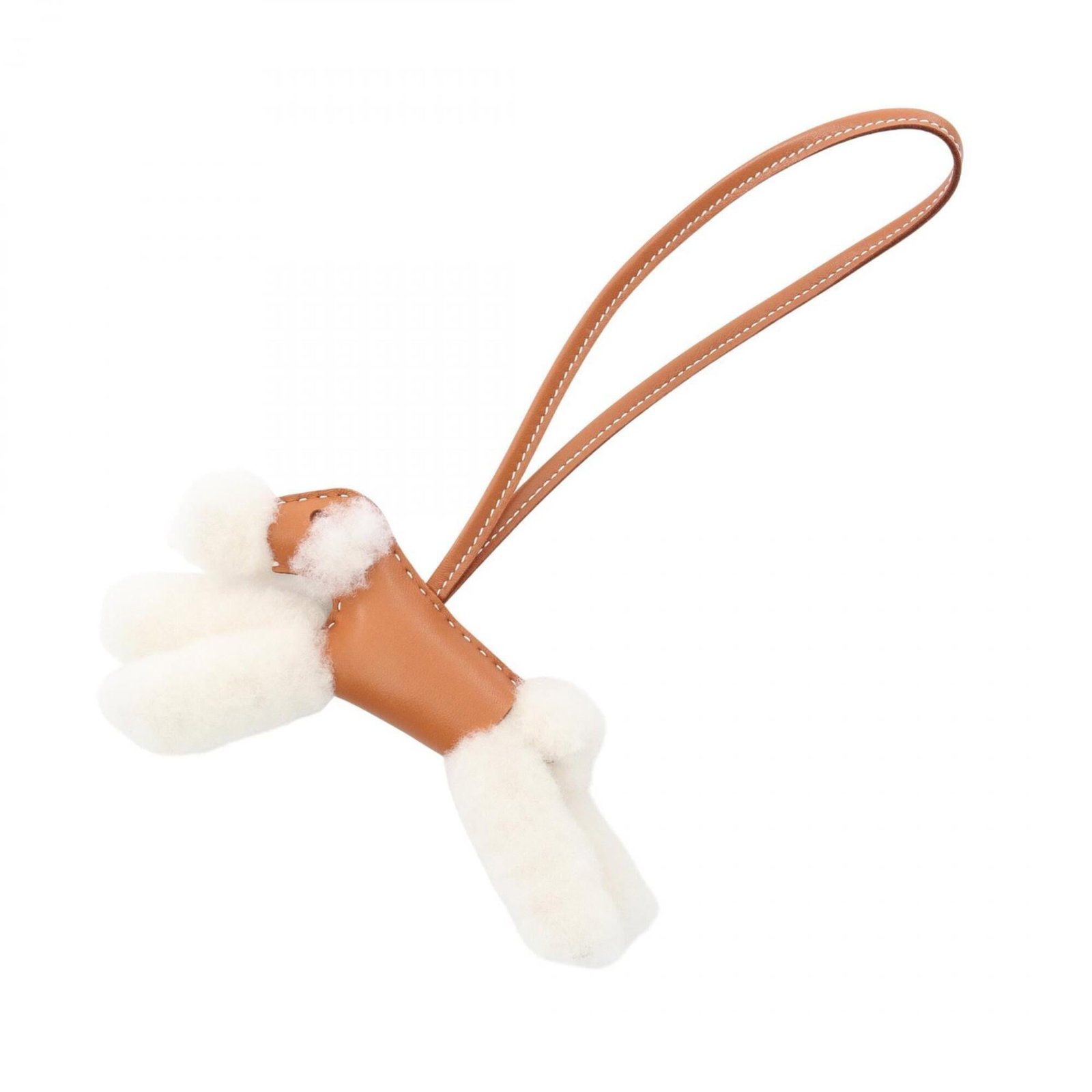 Handbag Charm Agneau Hermes Leather: Handbag Charm Agneau Hermes Leather Agneau Milo, Leather Mouton Handbag Charm from Hermes Features Brown and White Coloration. This unique charm showcases the distinctive Agneau Milo fur pattern on a 