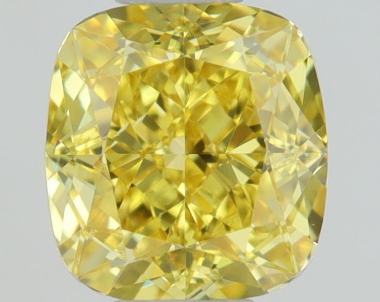 GIA Cushion Brilliant 0.5ct Fancy Vivid Yellow VVS1 - Loose Natural Diamond: GIA Cushion Brilliant 0.5ct Fancy Vivid Yellow VVS1 - Loose Natural Diamond GIA certified, this 0.5ct Fancy Vivid Yellow VVS1 diamond boasts exceptional clarity and color, with EX polish and VG symmet