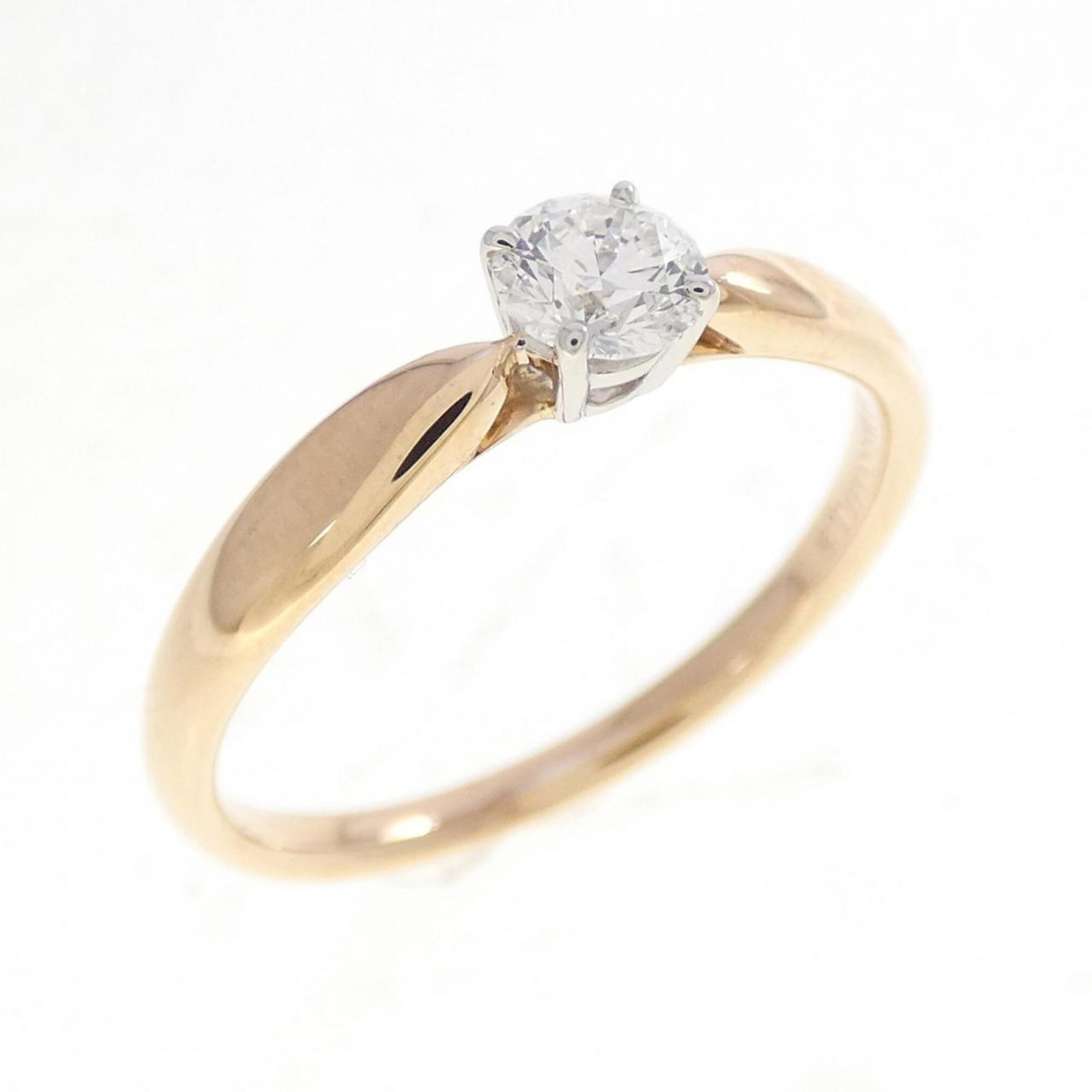 Pink Gold 950 Tiffany Ring Band Platinum: Pink Gold 950 Tiffany Ring Band Platinum Pink gold and platinum come together in this elegant Tiffany ring band, adorned with a diamond stone. The 18K pink gold and platinum construction provides a lu