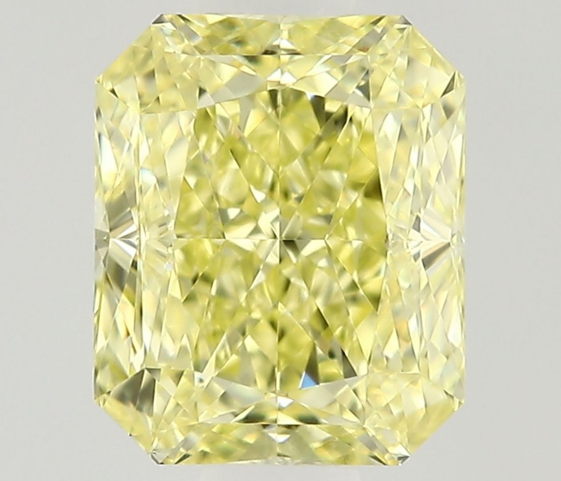 GIA Radiant 0.62ct Fancy Yellow VVS1 - Loose Natural Diamond: GIA Radiant 0.62ct Fancy Yellow VVS1 - Loose Natural Diamond GIA certified, this loose natural Fancy Yellow VVS1 diamond boasts an EX polish and VG symmetry. Measuring 5.2L x 4.28W x 2.93H, its vibran