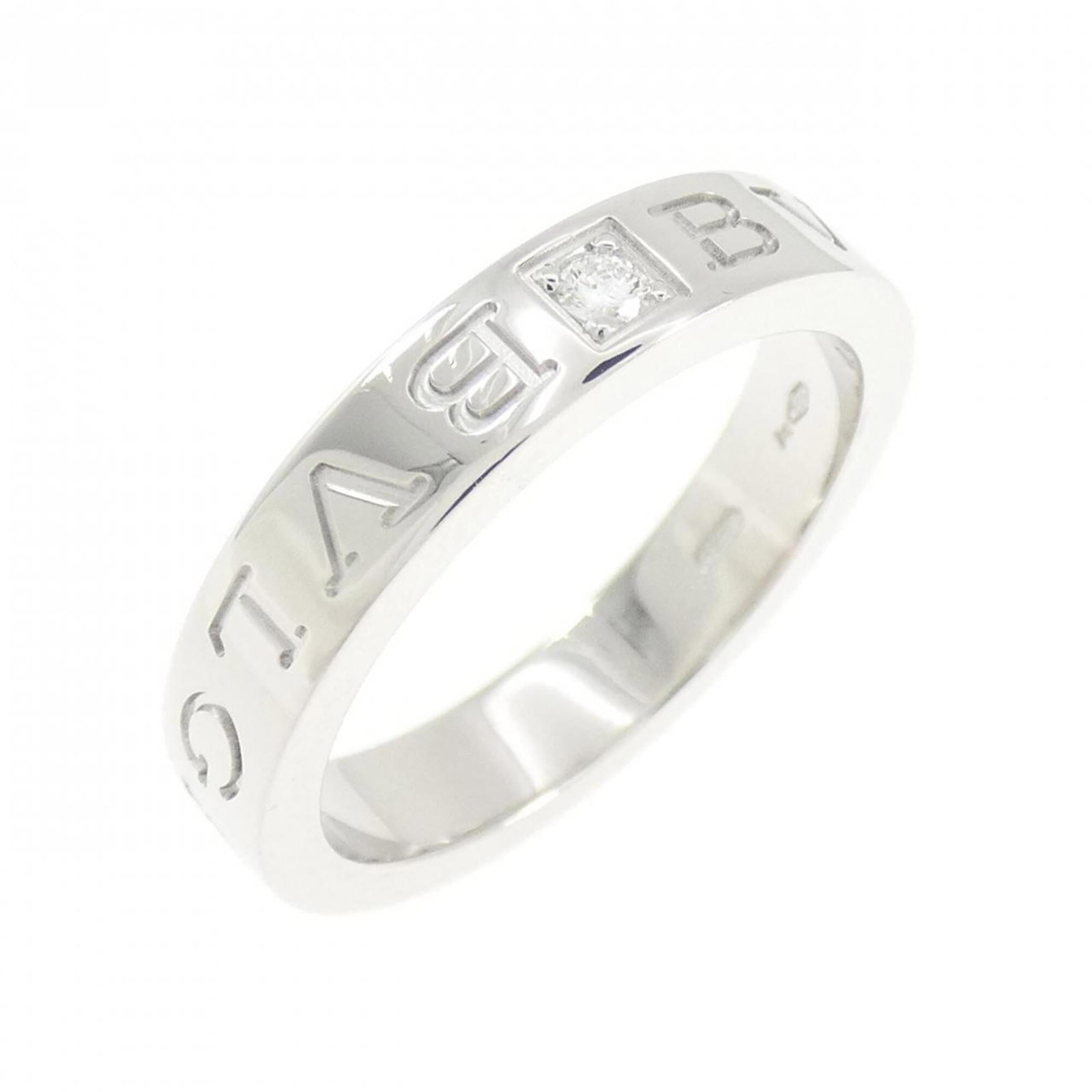 Bvlgari Band Ring White Gold (18K): Bvlgari Band Ring White Gold (18K) Bvlgari Band Ring White Gold (18K) - A sleek and modern band ring crafted from high-quality white gold, available in a US size 7.5. This elegant design makes it suit