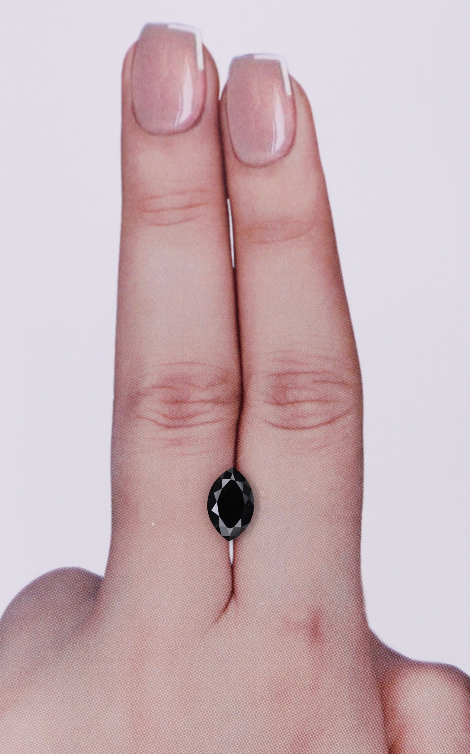 GIA Marquise 1.16ct Fancy Black VVS2 - Loose Natural Diamond: GIA Marquise 1.16ct Fancy Black VVS2 - Loose Natural Diamond GIA-certified, loose natural diamond with exceptional clarity and polish. This 1.16ct Fancy Black VVS2 marquise-cut stone boasts impressive