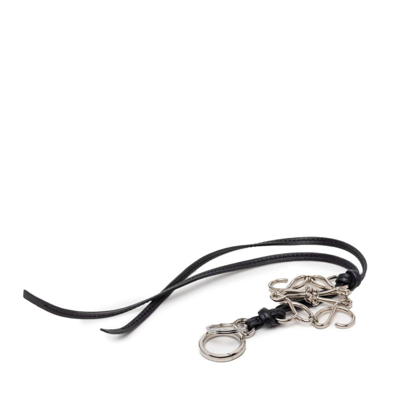 Leather charm handbag by Loewe: Leather charm handbag by Loewe Leather charm handbag by Loewe, featuring black and silver accents. This stylish bag measures 440mm x 80mm x 17.32'' x 3.15''. Made from high-quality leather, it boasts 