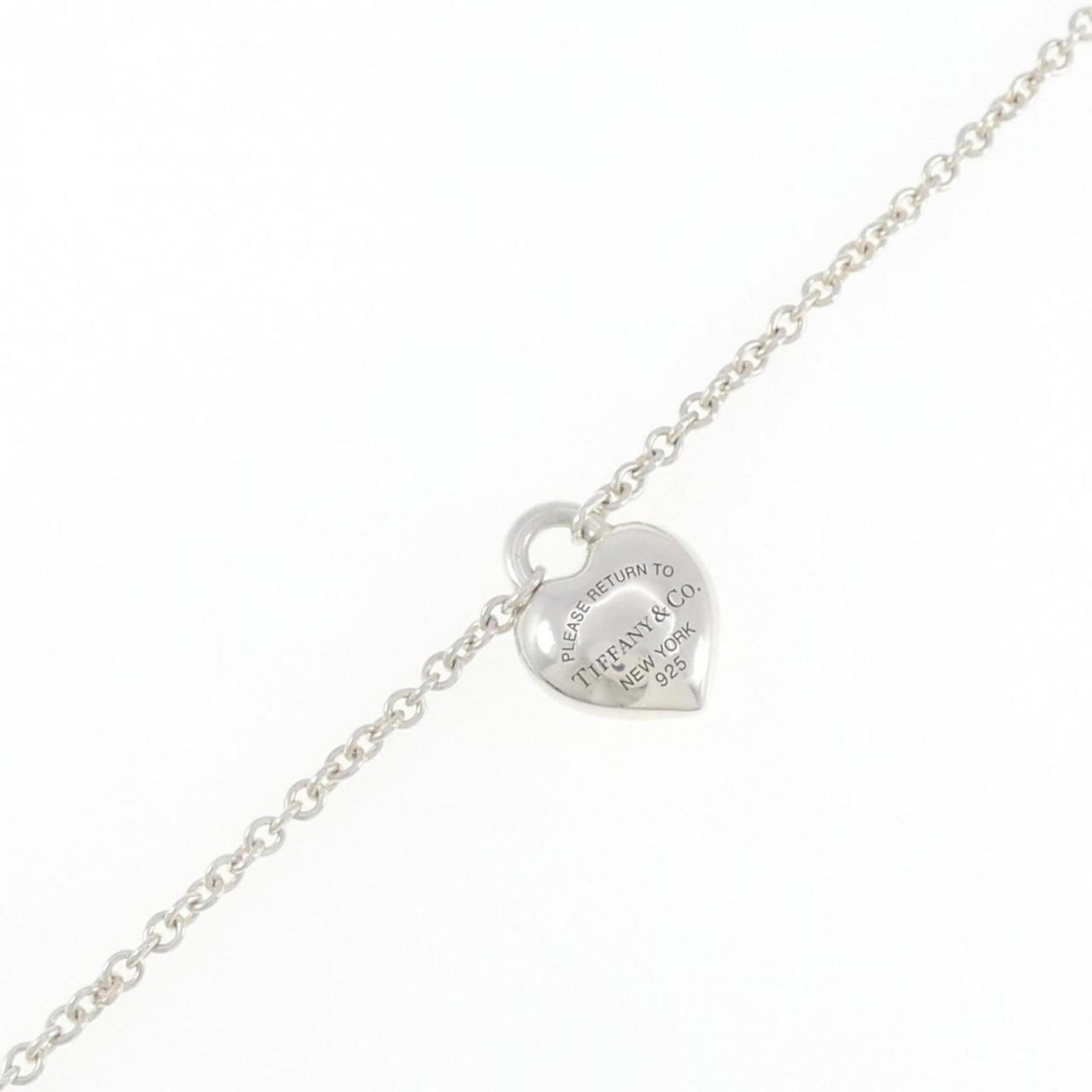 Charm bracelet silver 925: Charm bracelet silver 925 Silver 925 Charm bracelet from Tiffany's Return To Tiffany collection, featuring a sleek and modern design with a total length of 14.5cm. Made from high-quality silver metal,
