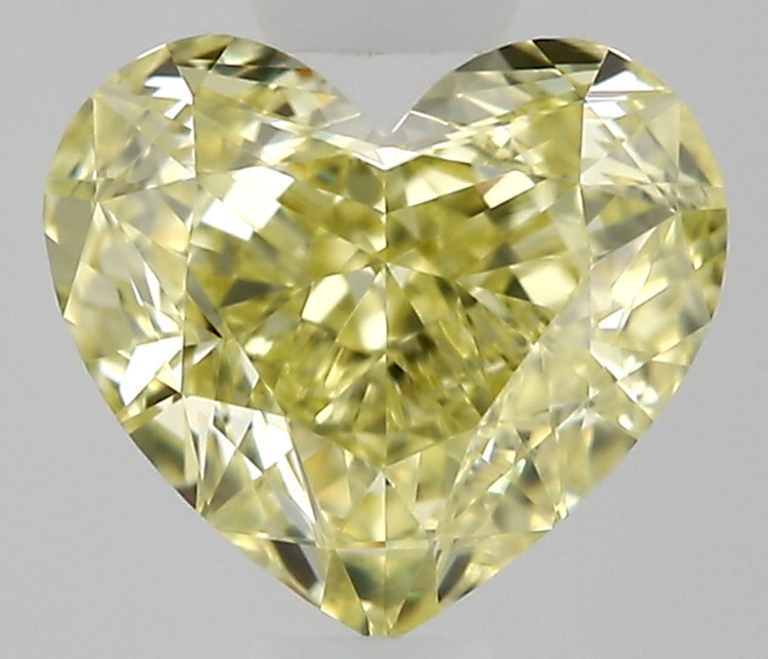 GIA Heart 0.78ct Fancy Yellow VVS1 - Loose Natural Diamond: GIA Heart 0.78ct Fancy Yellow VVS1 - Loose Natural Diamond GIA-certified, this loose natural Fancy Yellow diamond boasts exceptional clarity with a VVS1 rating and impressive polish for maximum brilli