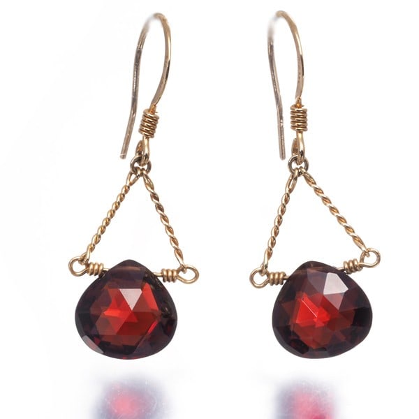 Gold 10k 416 Hook Garnet Yellow Solitaire Earrings: Gold 10k 416 Hook Garnet Yellow Solitaire Earrings Yellow gold 10k 416 hook garnet yellow solitaire earrings feature a natural garnet stone set in a simple yet elegant design, showcasing the beauty of