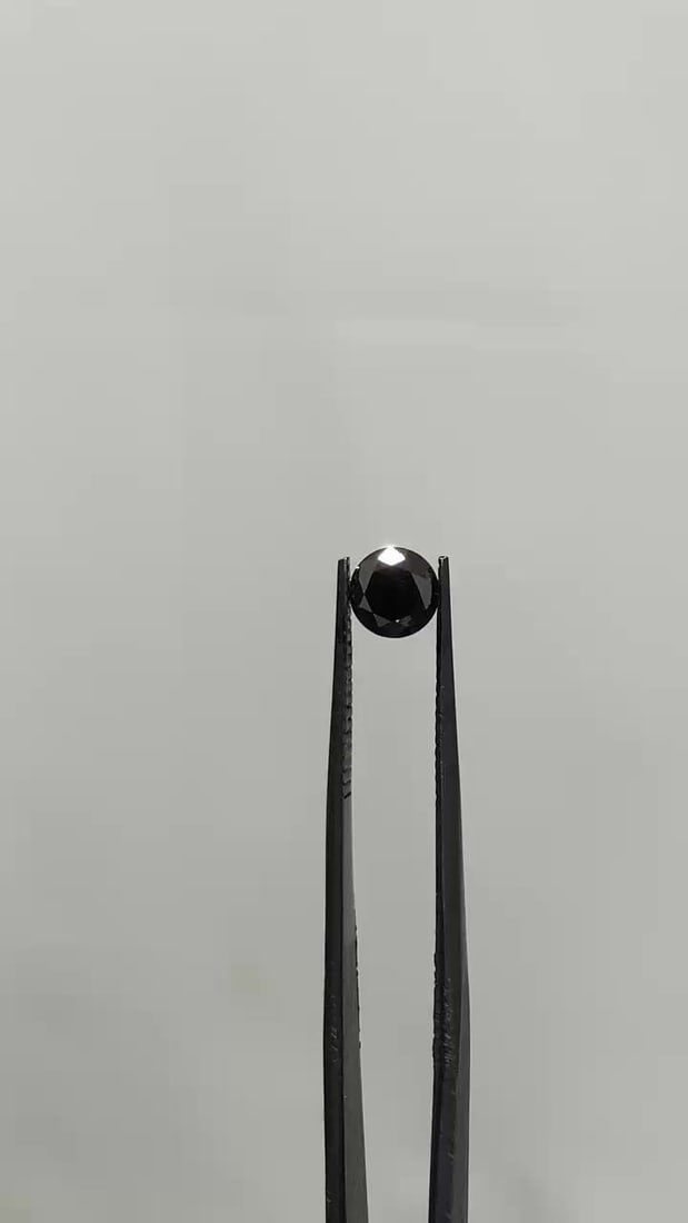 GIA Round 0.75ct Fancy Black VVS2 - Loose Natural Diamond: GIA Round 0.75ct Fancy Black VVS2 - Loose Natural Diamond GIA Round 0.75ct Fancy Black VVS2 - Loose Natural Diamond, certified by the Gemological Institute of America (GIA) as a Fancy Black diamond wi