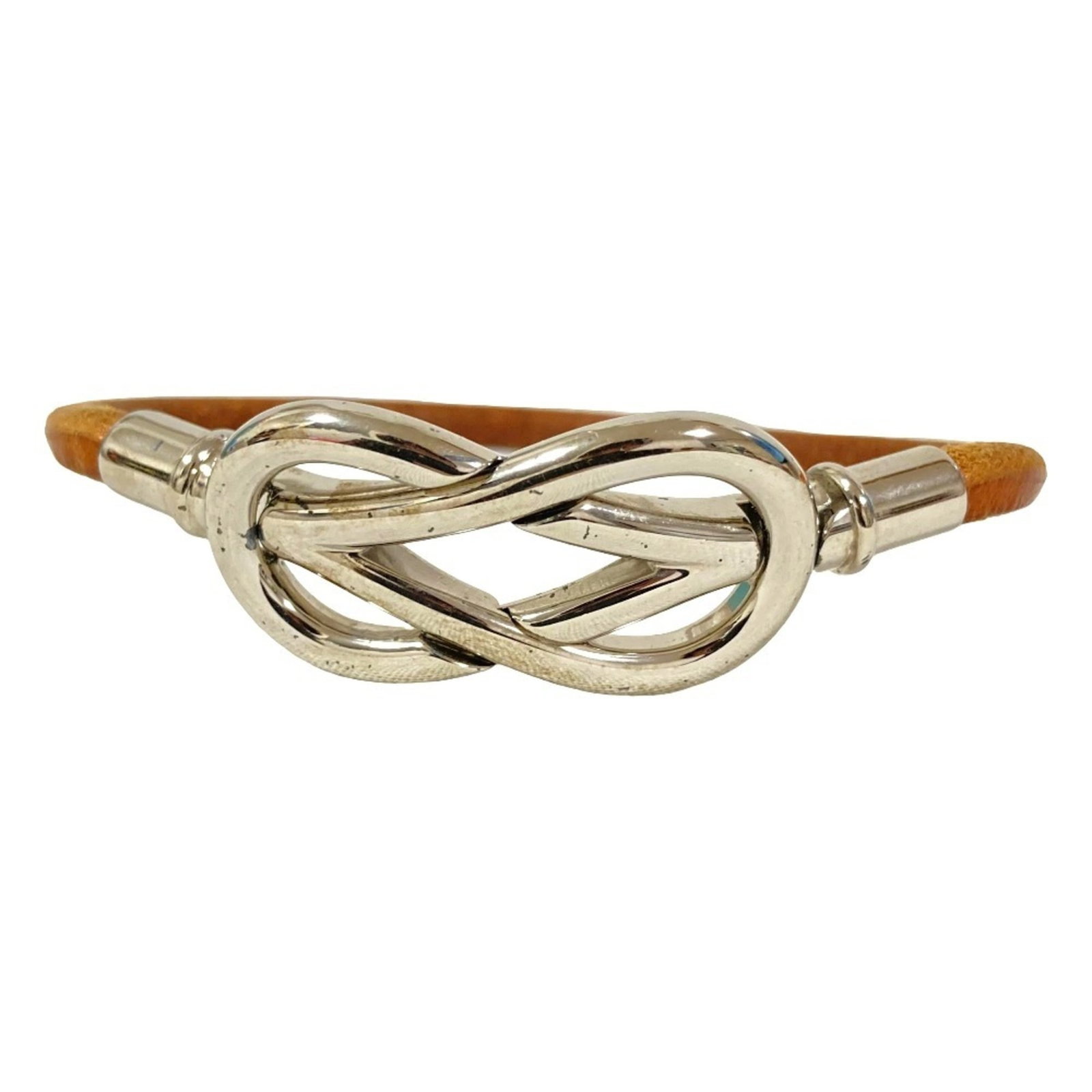 Hermes Charm: Hermes Charm Brown and silver charm bracelet from Hermes, measuring 17cm in length. This classic design showcases the brand's signature style with its elegant combination of materials. The charm brace