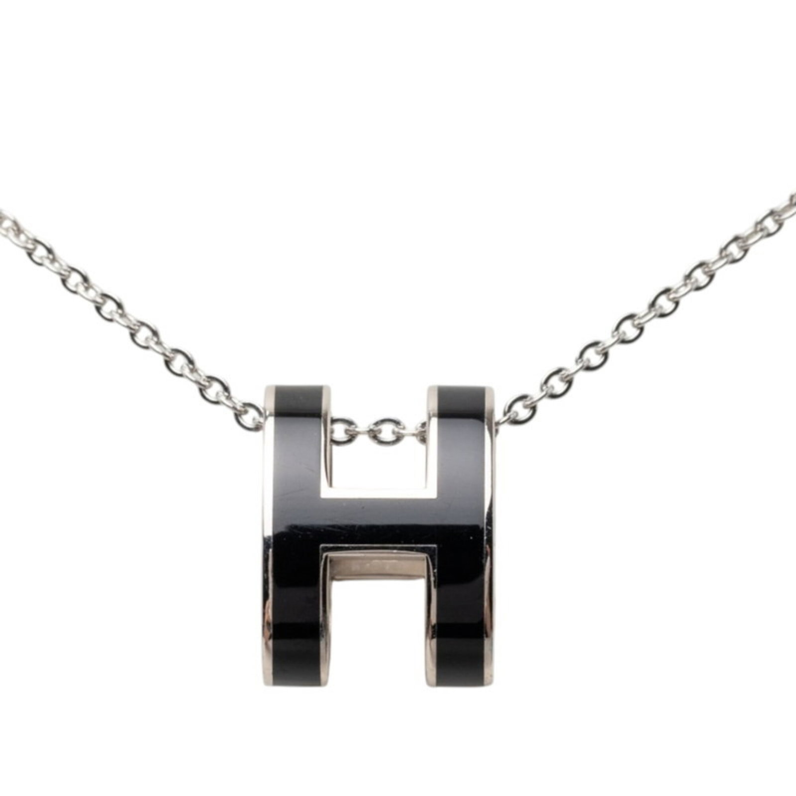 Hermes Pop H Necklace Silver And Black Metal Women'S: Hermes Pop H Necklace Silver And Black Metal Women'S Silver and black metal details add an edgy touch to this sleek Hermes Pop H necklace, featuring a striking pendant with precise measurements. The