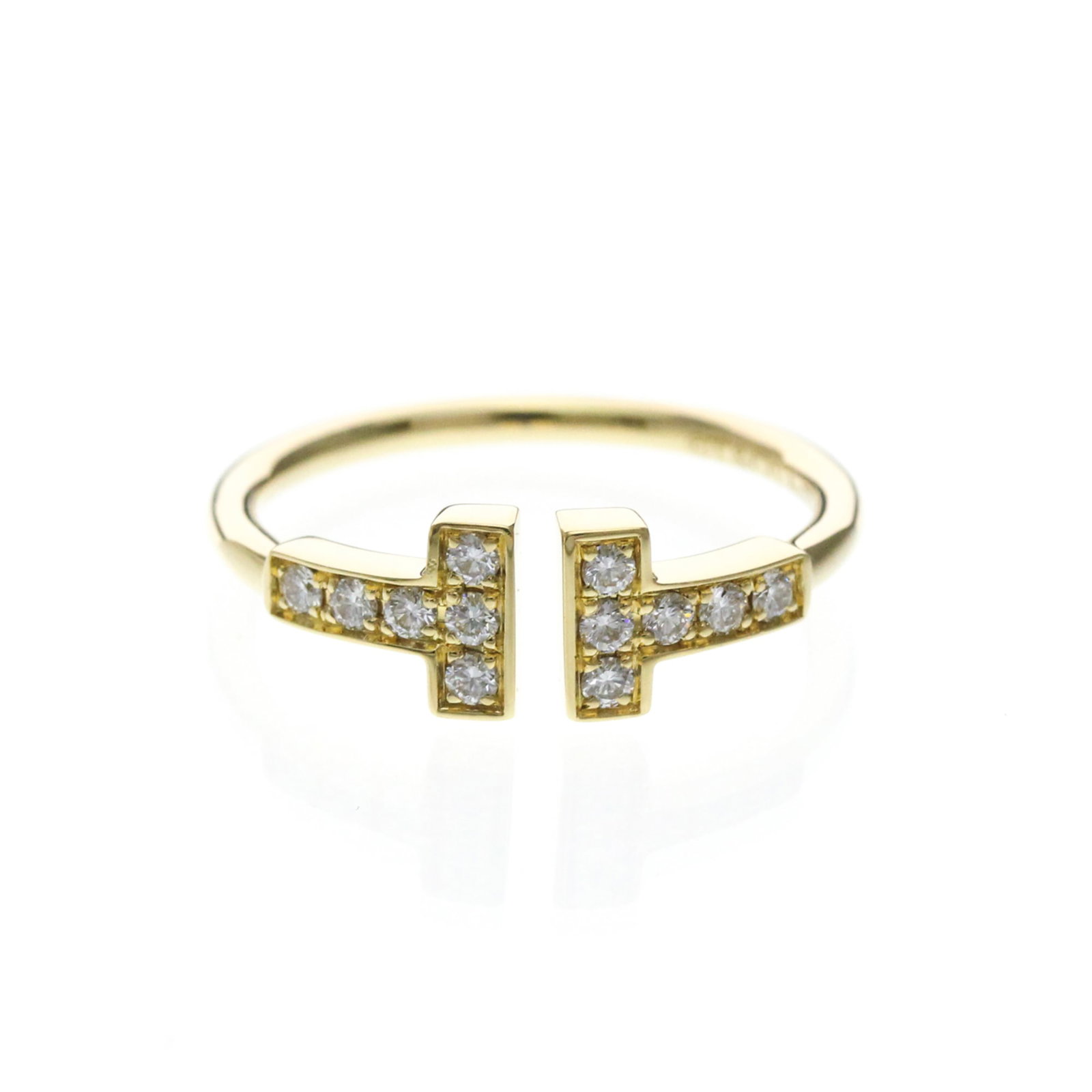 Tiffany ring gold 18k yellow band: Tiffany ring gold 18k yellow band 18k yellow gold band ring with diamond, crafted in the iconic Tiffany style. This elegant fashion piece boasts a sturdy wire design and features a high-quality diamon