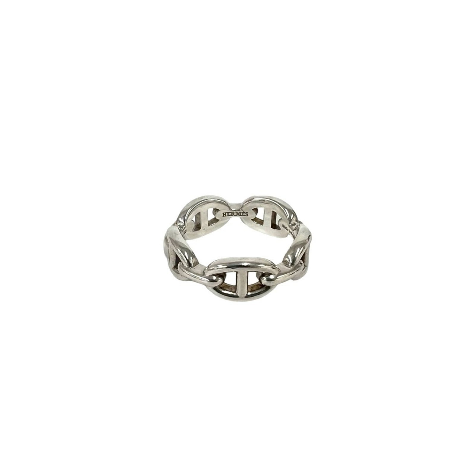 Ring silver band 925 by Hermes: Ring silver band 925 by Hermes Silver band ring by Hermes, made from high-quality silver (925), features a sleek and modern design. This women's ring is available in US size 8.5, providing a comfortab
