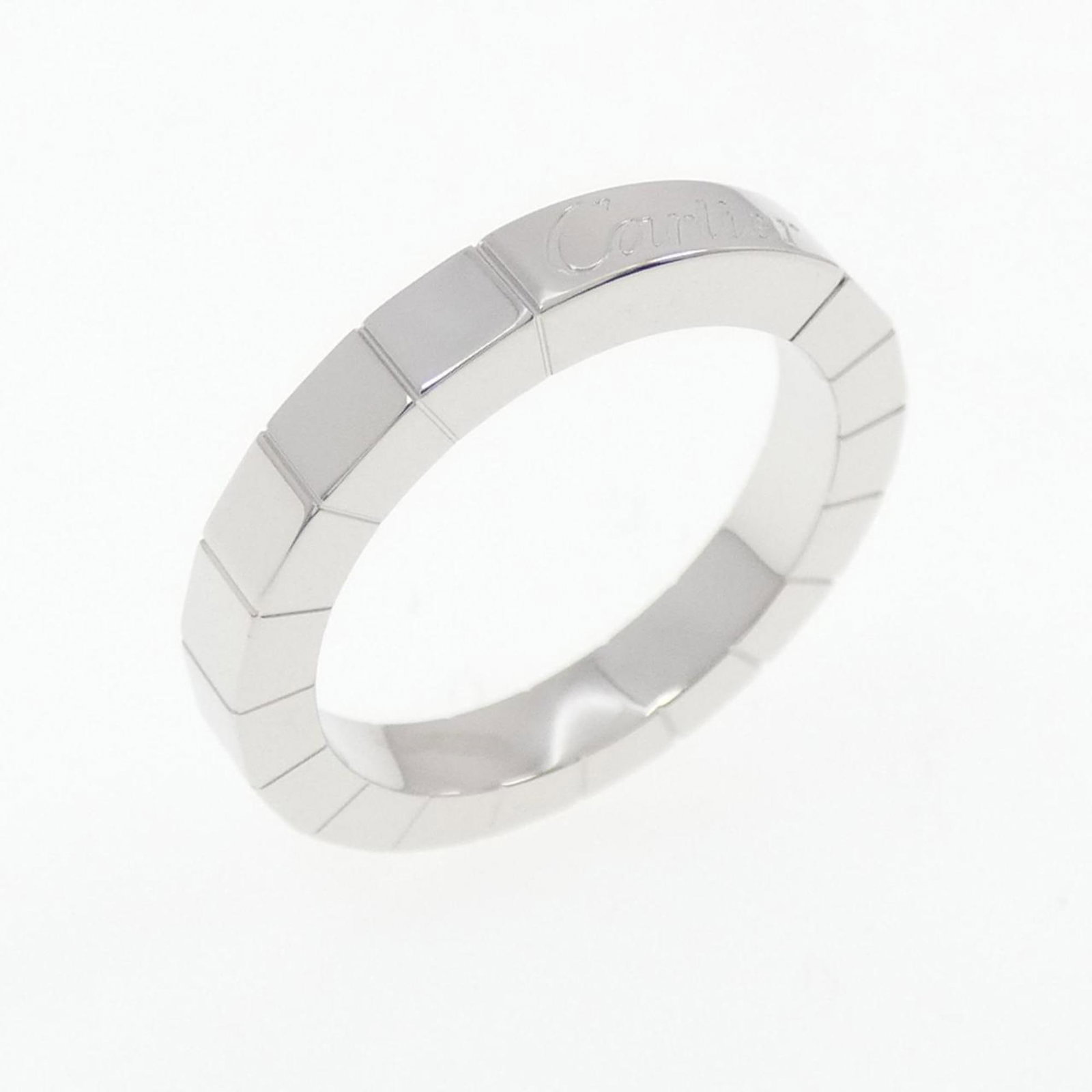 White Gold Band Ring by Cartier 18K: White Gold Band Ring by Cartier 18K Cartier's 18K white gold band ring boasts sleek sophistication with its classic design and premium materials. This women's band ring measures 47 US size 4, offering