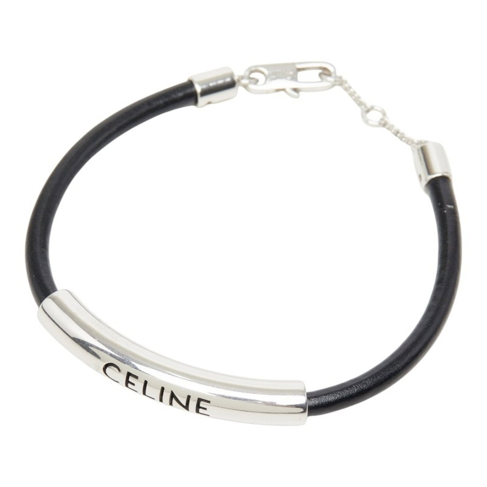 Metal leather bracelet celine charm: Metal leather bracelet celine charm Black metal and leather charm bracelet with a notable signature. The sleek design features a prominent Celine MPN FCA2204 charm, crafted from high-quality materials