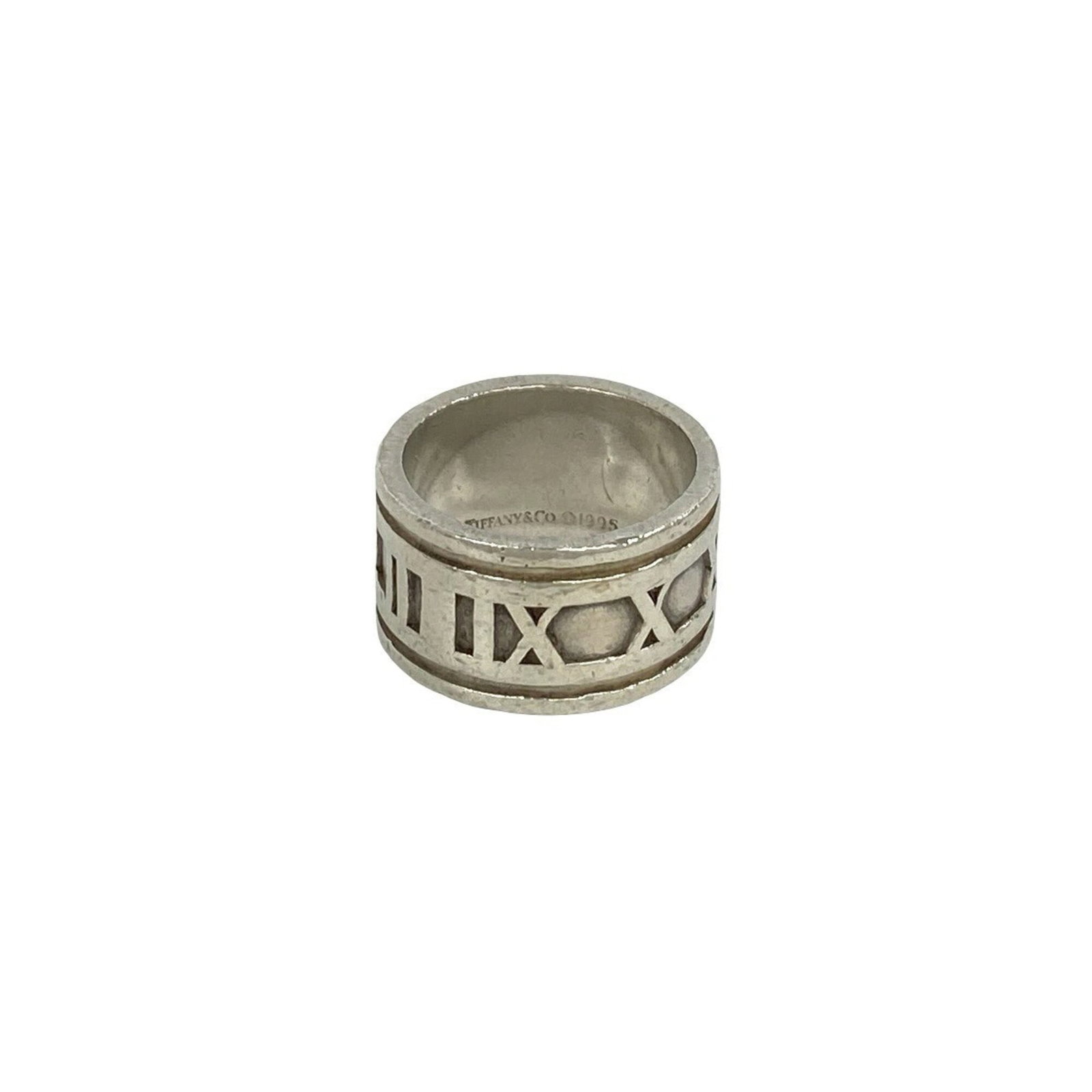 Silver Ring Band Tiffany: Silver Ring Band Tiffany Silver Ring Band Tiffany is made from high-quality silver, a durable and long-lasting material. The ring features a classic band design that suits women's style, available in 
