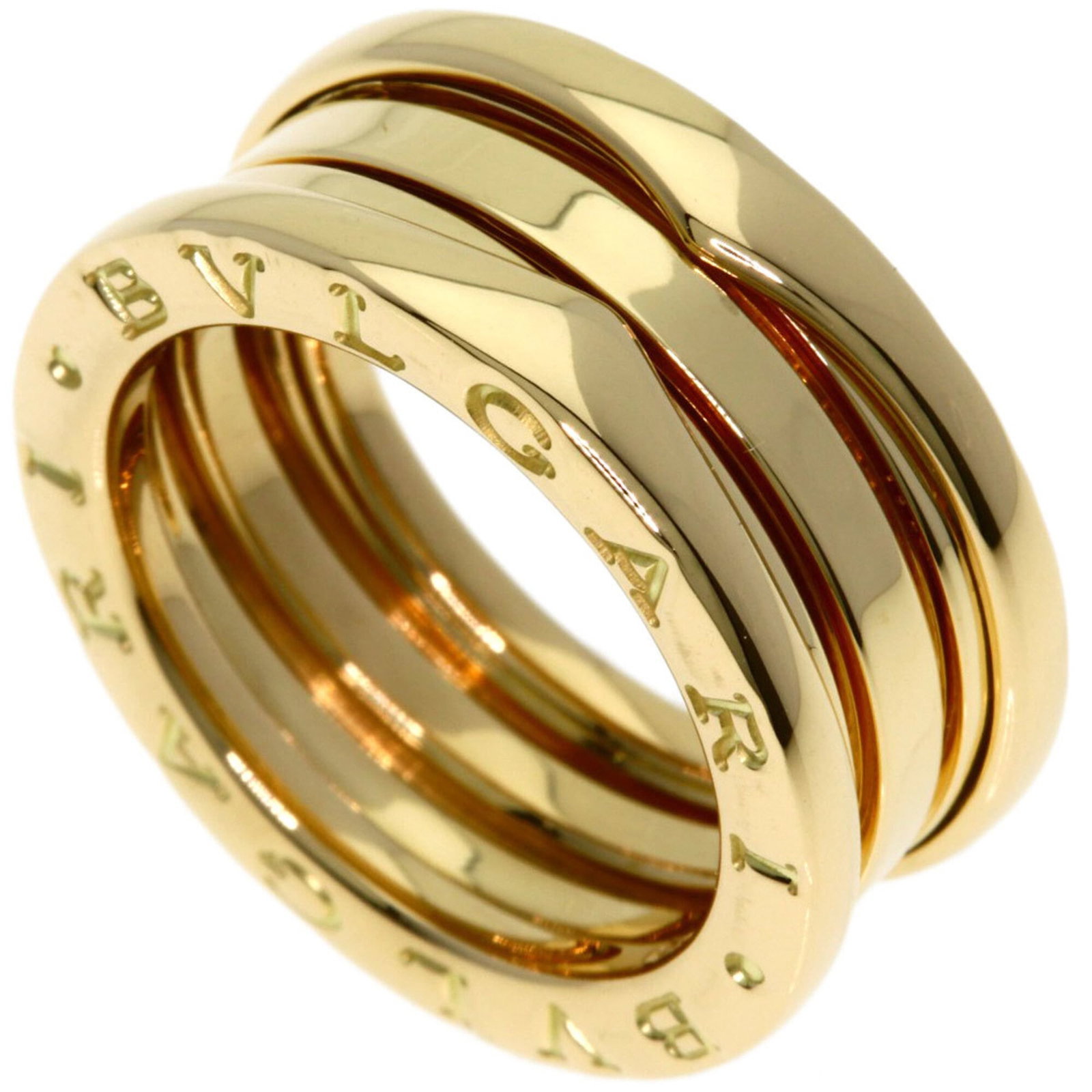 Bvlgari Band Ring Yellow Gold (18K): Bvlgari Band Ring Yellow Gold (18K) Yellow gold (18K) Bvlgari Band Ring, designed in the iconic B.zero1 line, boasts a sleek and modern aesthetic. Measuring 8.3mm in width, this 5.5 US size band ring 