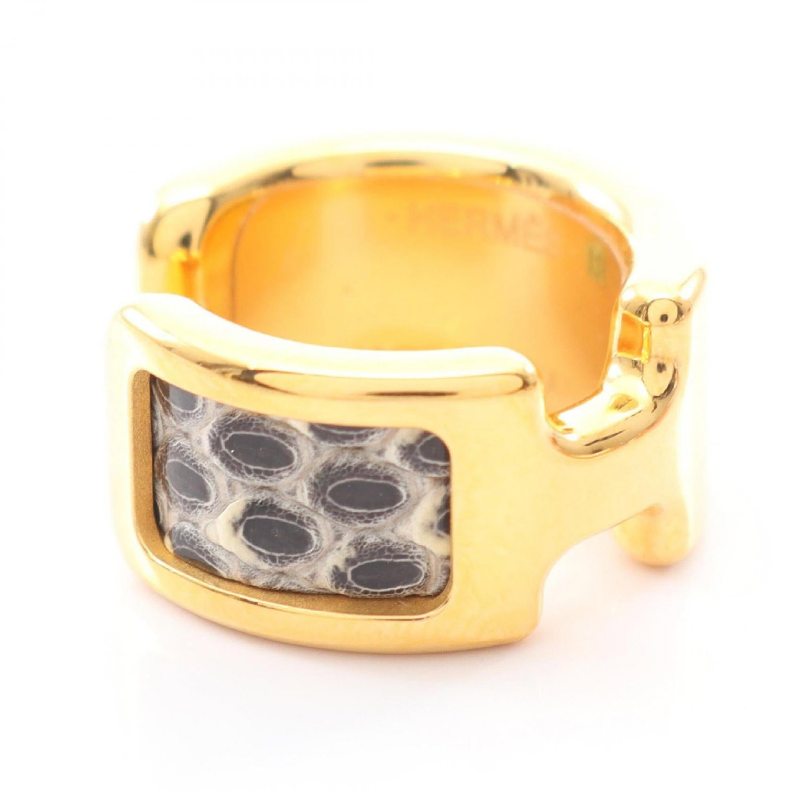 Hermes Earcuff Gold Plating Leather: Hermes Earcuff Gold Plating Leather Gold plating and sleek leather come together in this elegant earcuff from Hermes, with a sophisticated black finish and subtle gold accents. The compact design