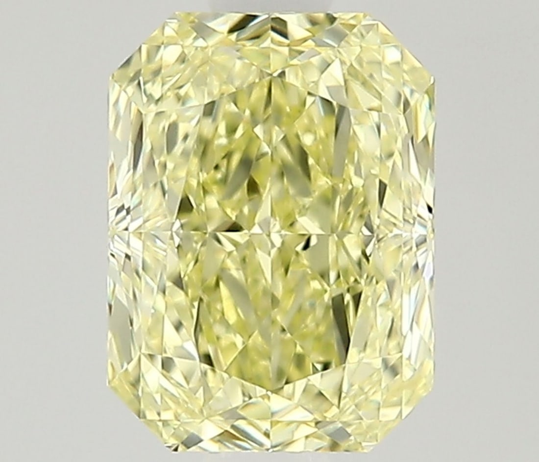 GIA Radiant 1.06ct Fancy Yellow VVS2 - Loose Natural Diamond: GIA Radiant 1.06ct Fancy Yellow VVS2 - Loose Natural Diamond GIA-certified, this 1.06ct Fancy Yellow VVS2 diamond boasts exceptional clarity and polish, with an EX symmetry that showcases its natural 