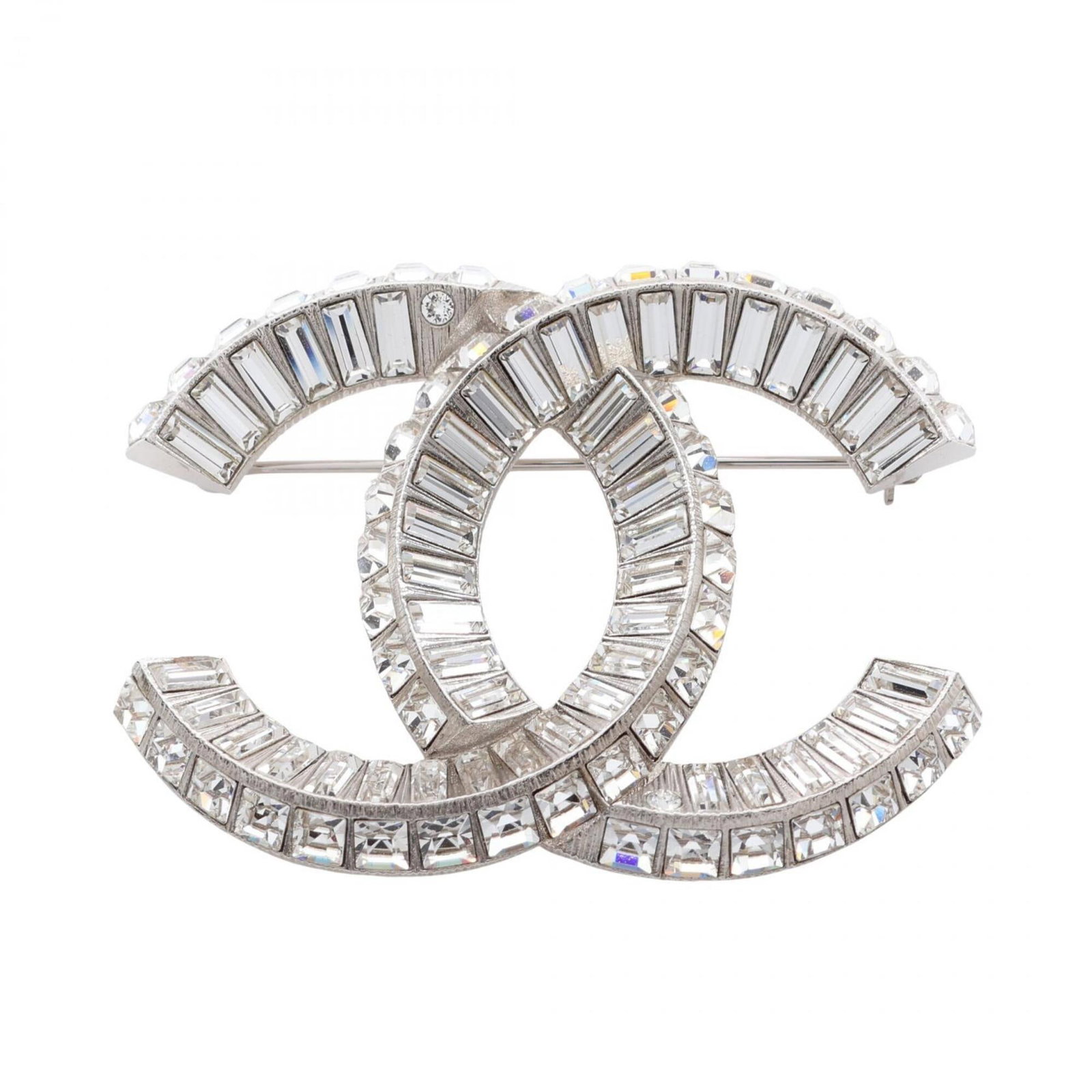 Chanel Brooch Rhinestone Stainless Steel: Chanel Brooch Rhinestone Stainless Steel The Chanel Brooch Rhinestone Stainless Steel boasts a striking design featuring clear rhinestones and stainless steel construction. Its sleek size makes it a v