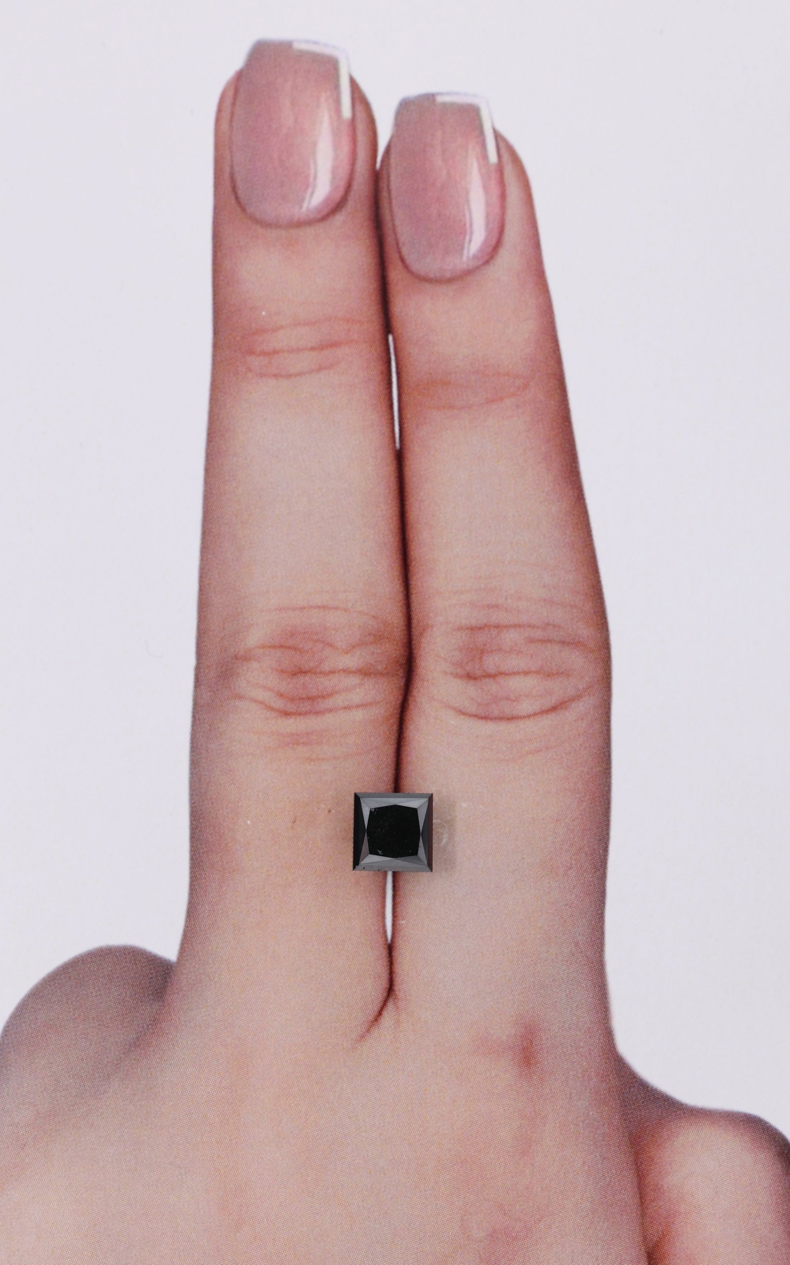 Princess 1.28ct Fancy Black VVS2 - Loose Natural Diamond: Princess 1.28ct Fancy Black VVS2 - Loose Natural Diamond The Princess cut diamond boasts an impressive 1.28 carats, showcasing its unique shape and size. Its Fancy Black color and VVS2 clarity add to 