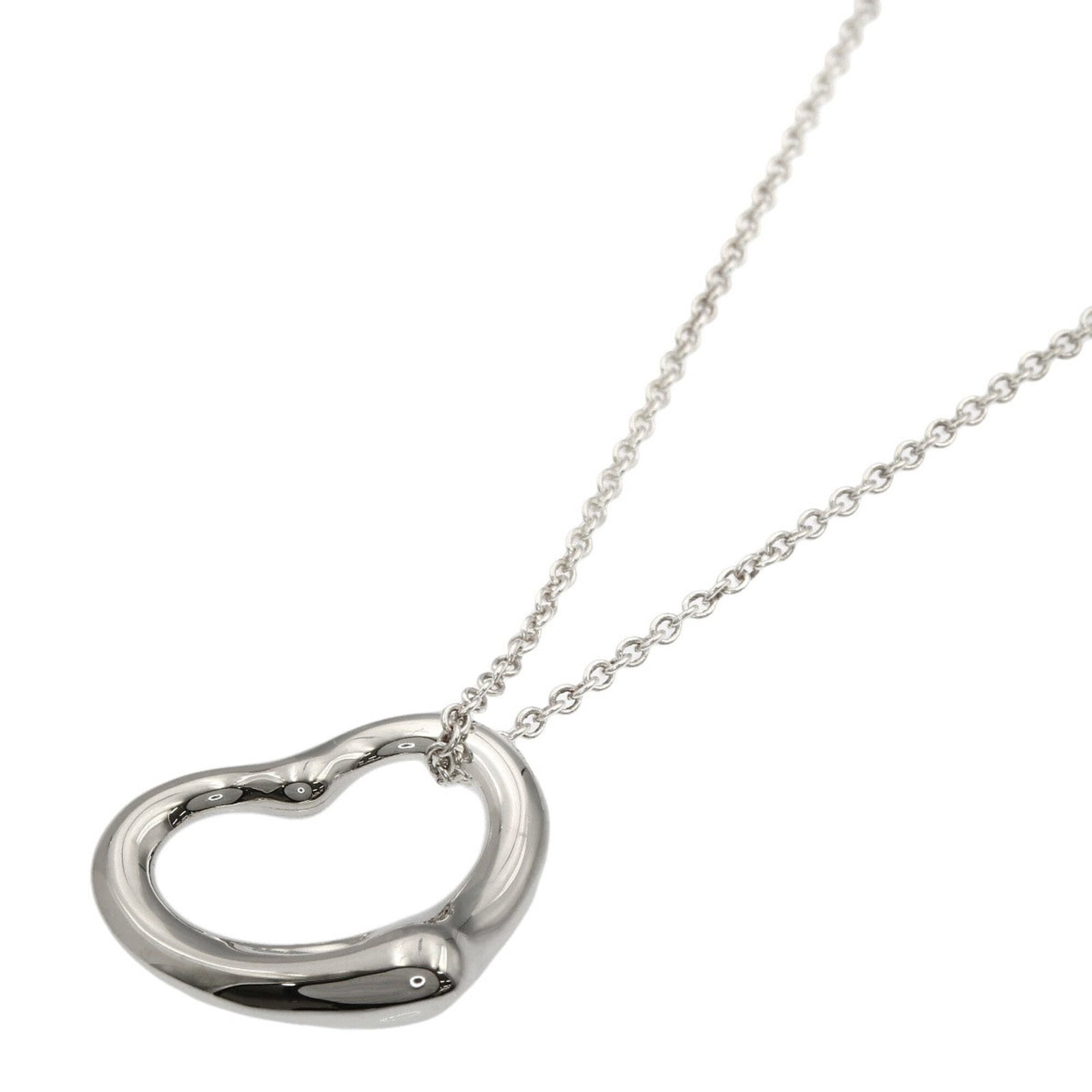 Tiffany & Co. Open Heart Necklace Silver Women'S.: Tiffany & Co. Open Heart Necklace Silver Women'S. Tiffany & Co. Open Heart Necklace in sterling silver, featuring a classic design with an open heart pendant, measures 21mm x 22mm and has a neck circu