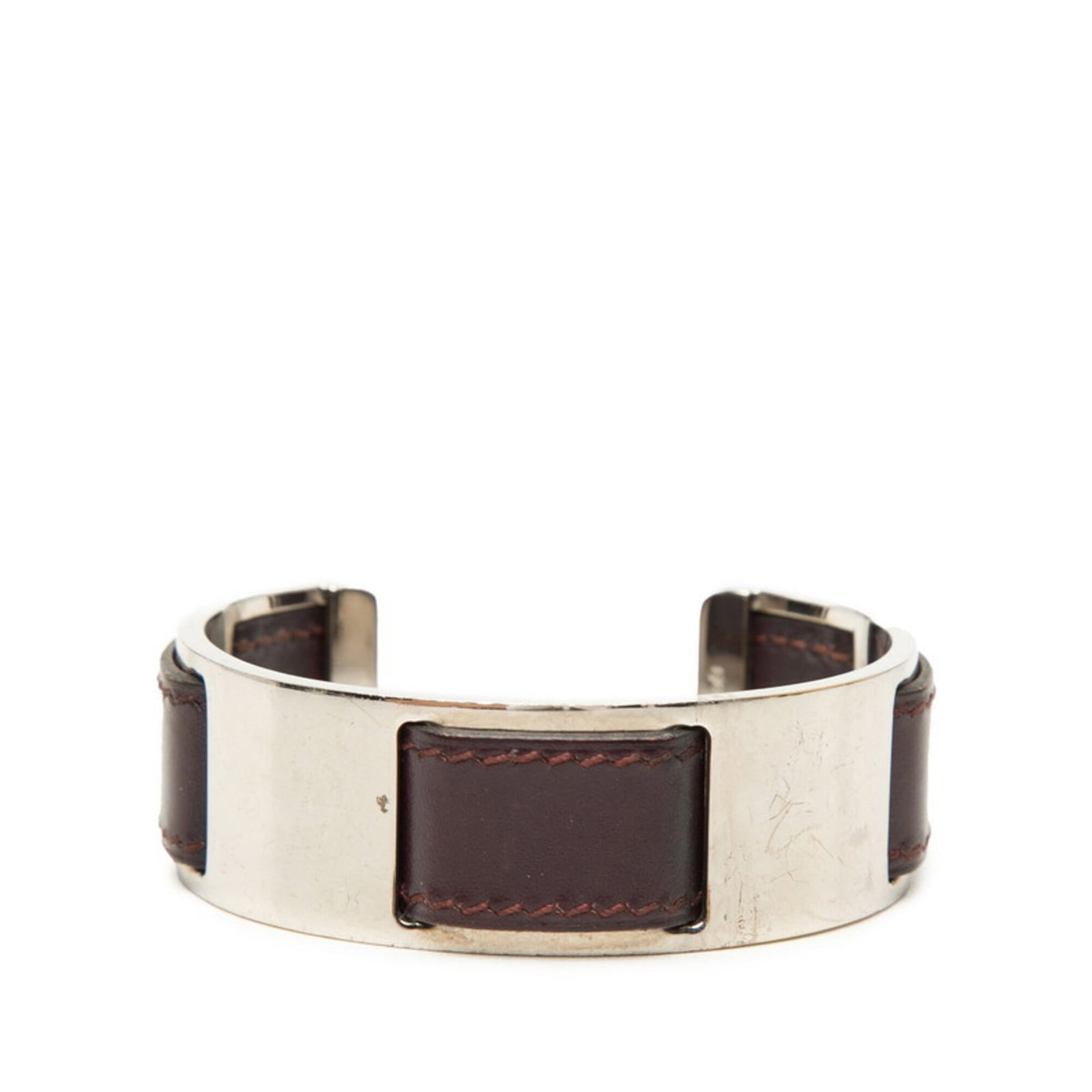 Hermes Bangle Leather Metal: Hermes Bangle Leather Metal The Hermes Bangle Leather Metal features a striking purple hue paired with silver accents, creating a sophisticated and elegant look. Made from high-quality leather and met