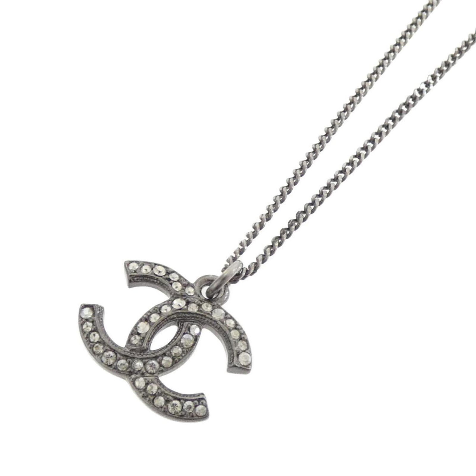 Chanel Necklace: Chanel Necklace Chanel Necklace features a clear, silver, and white design with a pendant size of 12mm x 17mm. The necklace has a neck circumference of 60 cm / 23.62'' and is made from the specified m