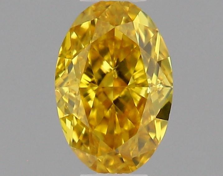 GIA Oval 0.27ct Fancy Vivid Orangey Yellow VVS2 - Loose Natural Diamond: GIA Oval 0.27ct Fancy Vivid Orangey Yellow VVS2 - Loose Natural Diamond GIA certified, this oval-cut diamond boasts a vibrant Fancy Vivid Orangey Yellow hue and exceptional clarity, graded VVS2. Its