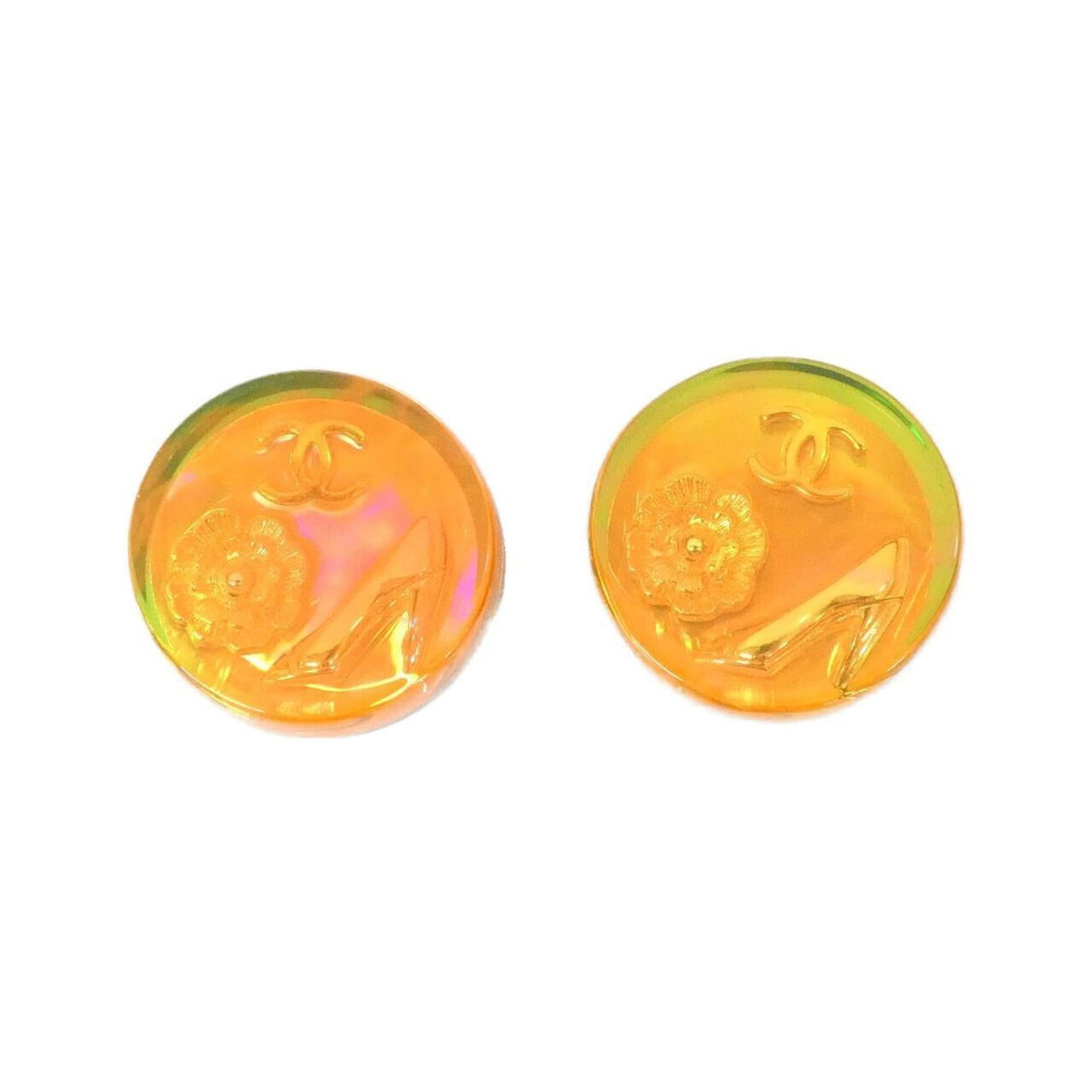 Chanel clip earrings: Chanel clip earrings Chanel clip earrings in vibrant orange, measuring 25.00mm x 25.00mm / 0.98'' x 0.98''. These sleek and modern earrings feature a bold color that adds a pop of personality to any o
