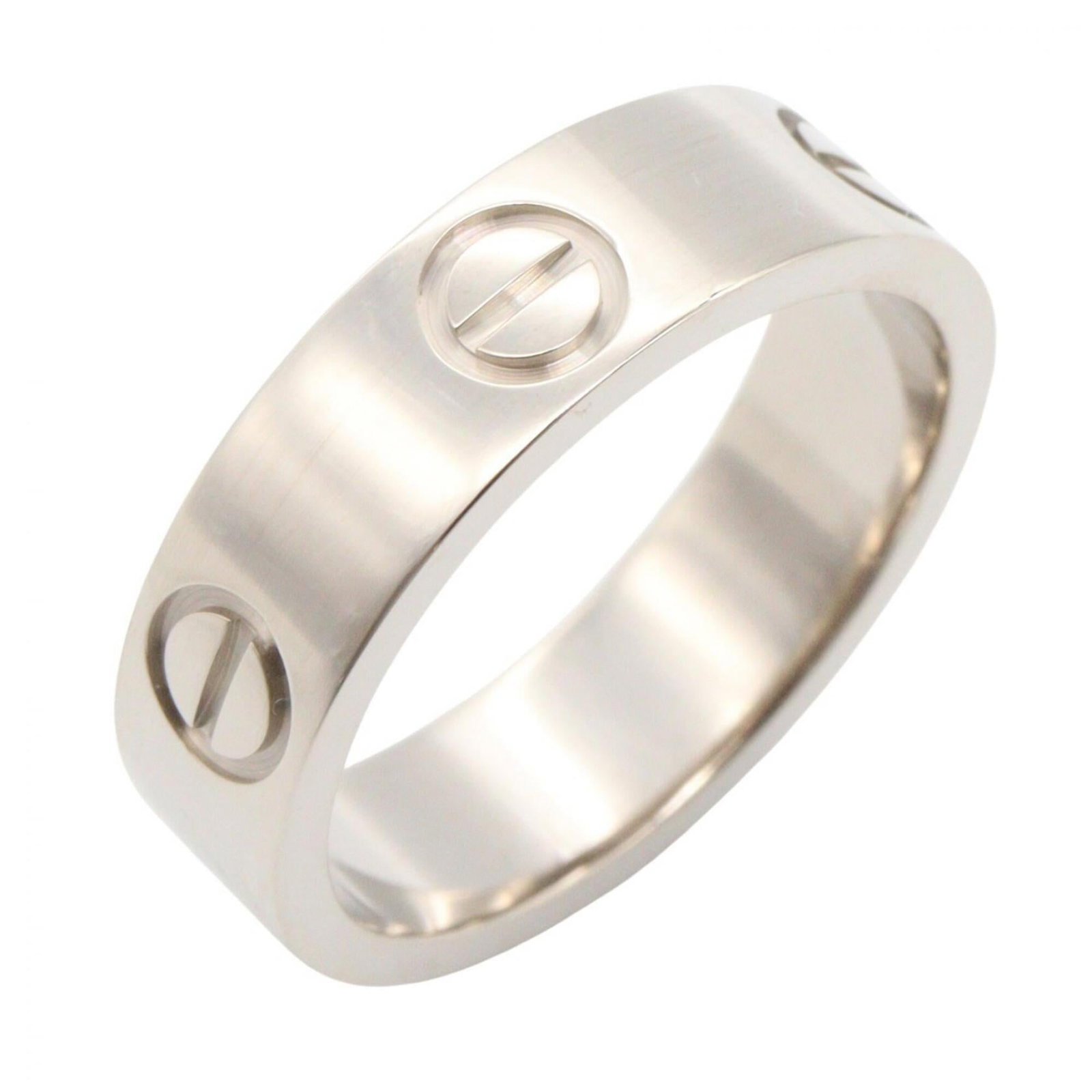 White Gold Band Ring by Cartier 18K: White Gold Band Ring by Cartier 18K White gold band ring by Cartier, featuring 18K material and a US size 6.5 fit. This elegant piece boasts a classic design that suits both men and women, making it a