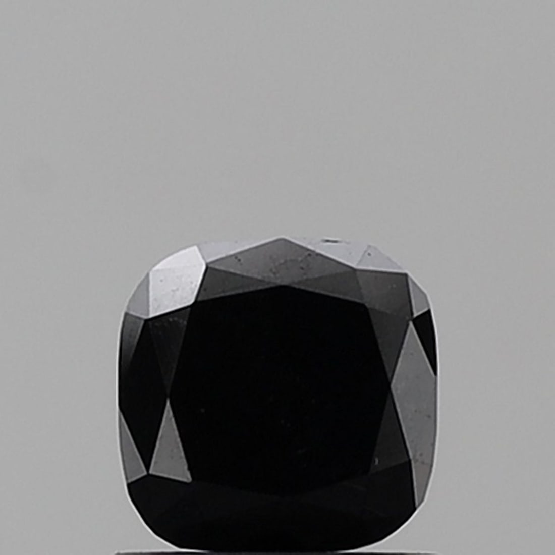 Cushion Brilliant 1.02ct Black VVS2 - Loose Natural Diamond: Cushion Brilliant 1.02ct Black VVS2 - Loose Natural Diamond 1.02ct Cushion Brilliant Black Diamond with exceptional clarity, featuring VVS2 and EX polish, showcasing its natural beauty in a unique bla