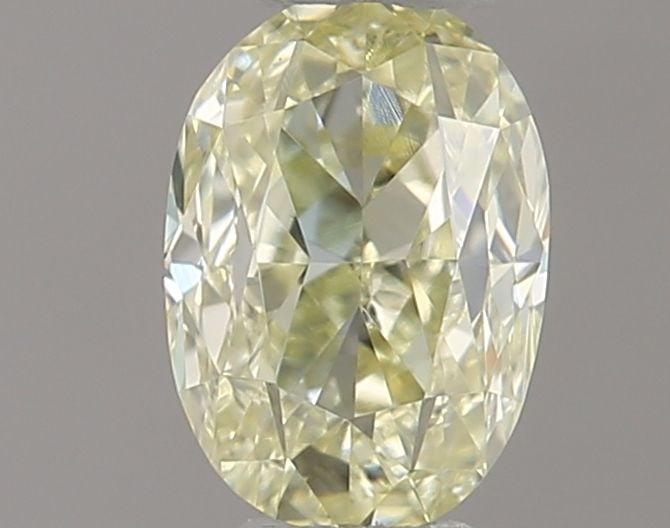 Oval 0.33ct Fancy Light Yellow VVS2 - Loose Natural Diamond: Oval 0.33ct Fancy Light Yellow VVS2 - Loose Natural Diamond Oval cut diamond with a Fancy Light Yellow color, measuring 5.85L x 3.14W x 2.17H, and certified VVS2 clarity, offering exceptional brillian