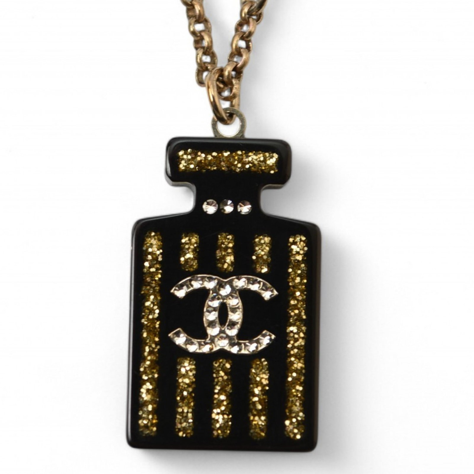 Coco Gold Rhinestone Pendant Bottle Motif Necklace Black: Coco Gold Rhinestone Pendant Bottle Motif Necklace Black Gold plating and rhinestones come together in a stylish Coco Gold design, featuring a pendant bottle motif on a black necklace. The piece is
