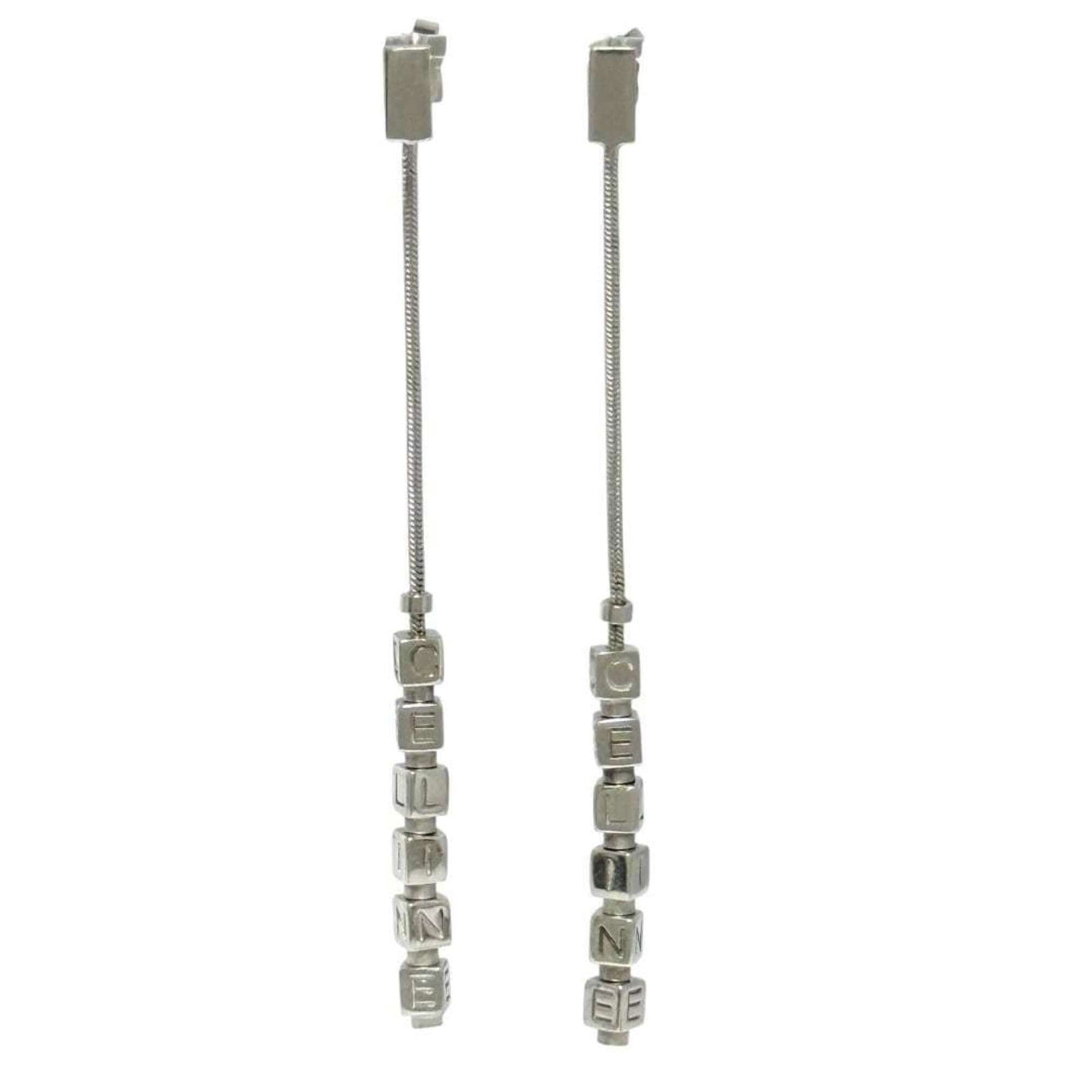 Celine Silver Earrings 925: Celine Silver Earrings 925 Silver earrings from Celine, made from high-quality silver 925 material. Drop in design with sleek dimensions of 85mm x 4mm. Item Specifics: Brand: Celine Type: Drop earring
