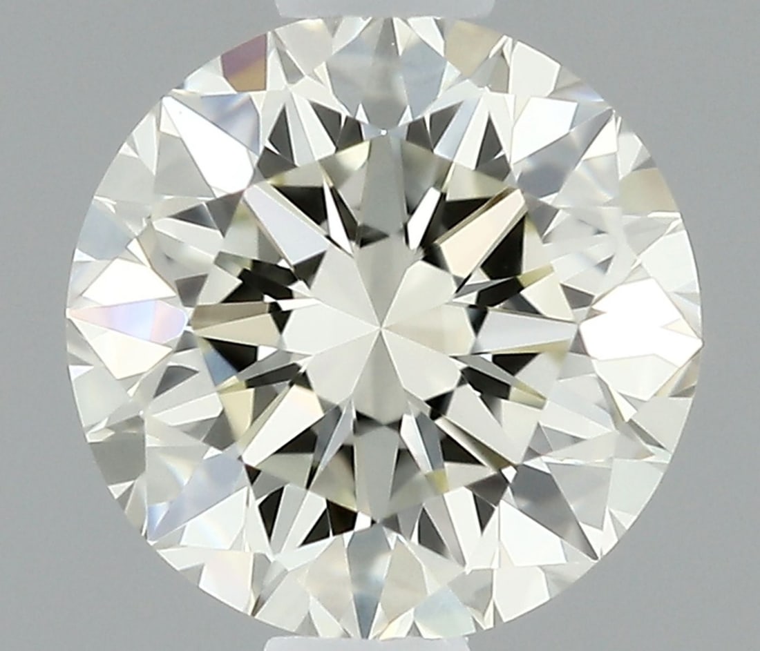 IGI Round 0.6ct K IF - Loose Natural Diamond: IGI Round 0.6ct K IF - Loose Natural Diamond 0.6ct IGI Round K IF Diamond - Natural BeautyThis exquisite loose diamond boasts an impressive 0.6 carats, certified by the International Gemological