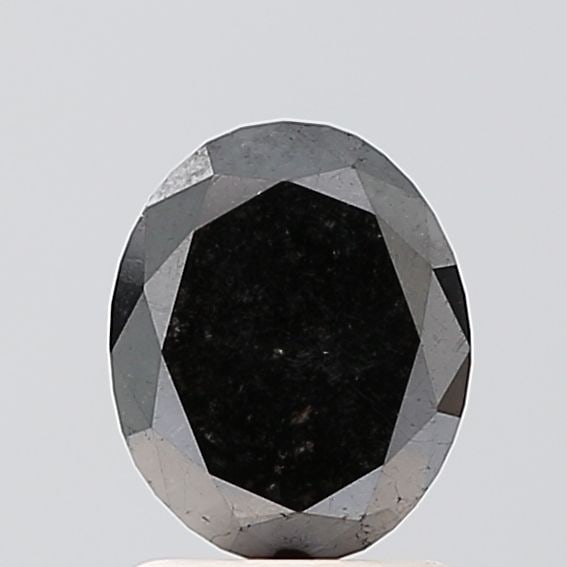 Oval 1.2ct Black VVS2 - Loose Natural Diamond: Oval 1.2ct Black VVS2 - Loose Natural Diamond Oval cut diamond with exceptional clarity, featuring a VVS2 grade and EX polish. Its natural black color adds an air of mystery to its beauty. Measuring