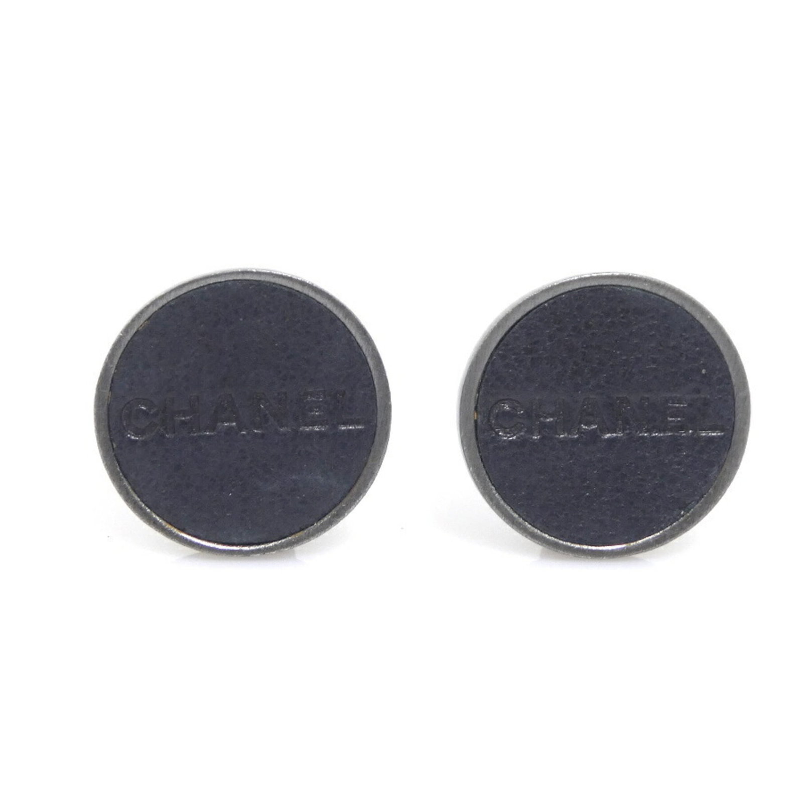 Chanel Clip Earrings Metal: Chanel Clip Earrings Metal Black and silver Chanel clip earrings made from metal, bearing the iconic brand's signature style. Made entirely in metal with no additional accessories. Item Specifics: