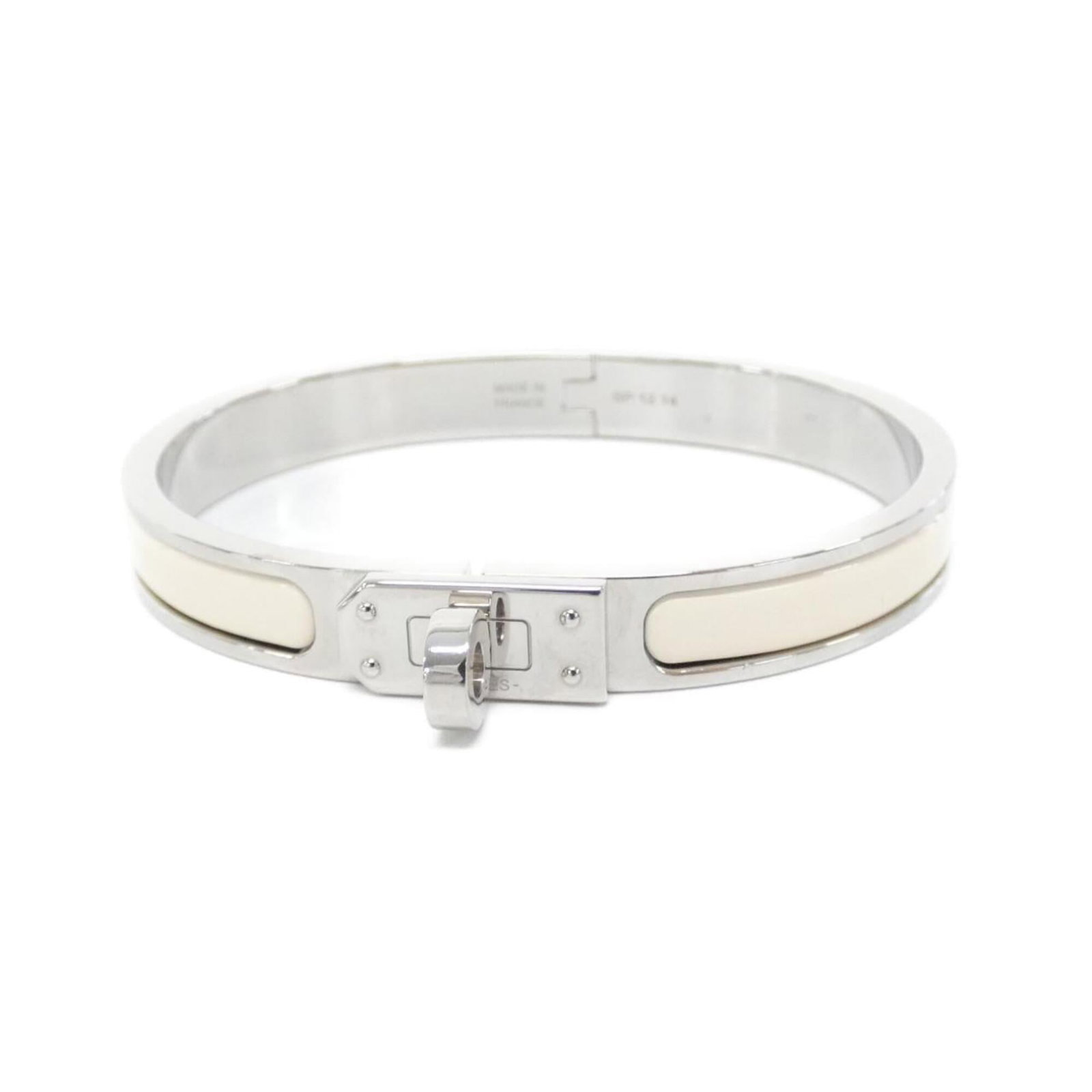 Hermes Charm Palladium Bracelet: Hermes Charm Palladium Bracelet Palladium charm bracelet from Hermes, featuring a classic design with a beige and silver finish. The 17.5cm length provides a comfortable fit for everyday wear. This el