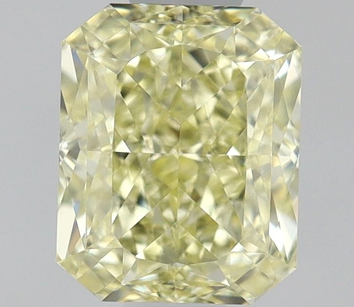 GIA Radiant 0.7ct Fancy Yellow VVS2 - Loose Natural Diamond: GIA Radiant 0.7ct Fancy Yellow VVS2 - Loose Natural Diamond GIA certification ensures the stone's exceptional quality. This loose, natural Fancy Yellow diamond boasts an impressive VVS2 clarity grade 
