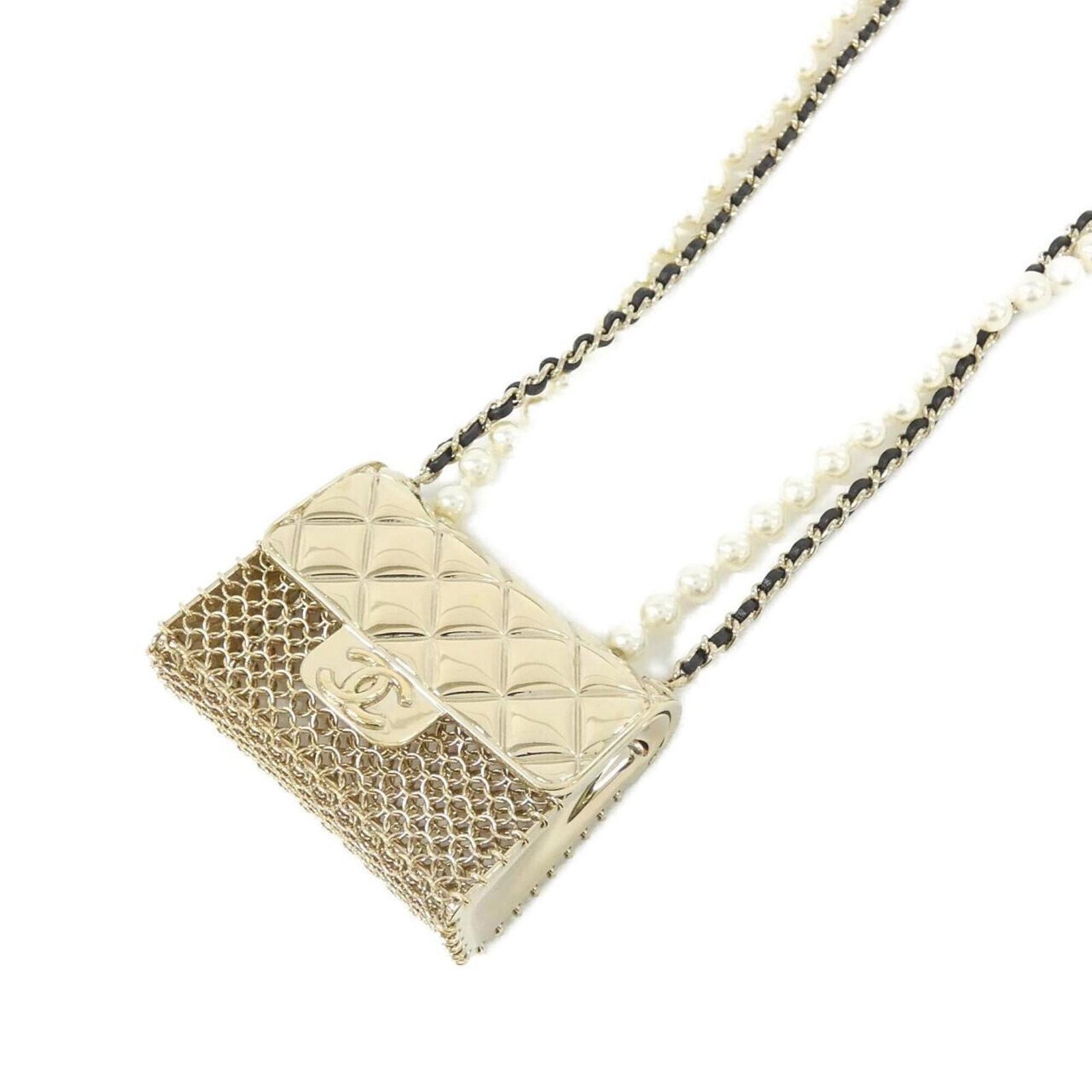 Ab6135 by Chanel Necklace: Ab6135 by Chanel Necklace The Ab6135 by Chanel Necklace boasts a sleek design, featuring artificial pearl and lambskin details. Its striking gold accents add a touch of luxury to the black and white c
