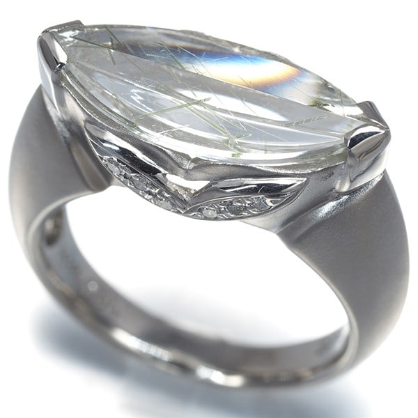 Rutile Quartz 3.06Ct Diamond 0.09Ct Ring 900 Platinum: Rutile Quartz 3.06Ct Diamond 0.09Ct Ring 900 Platinum 900 Platinum Rutile Quartz 3.06Ct Diamond Ring features a stunning natural rutile quartz main stone, approximately 7.5 x 16.2mm in size, surrounde